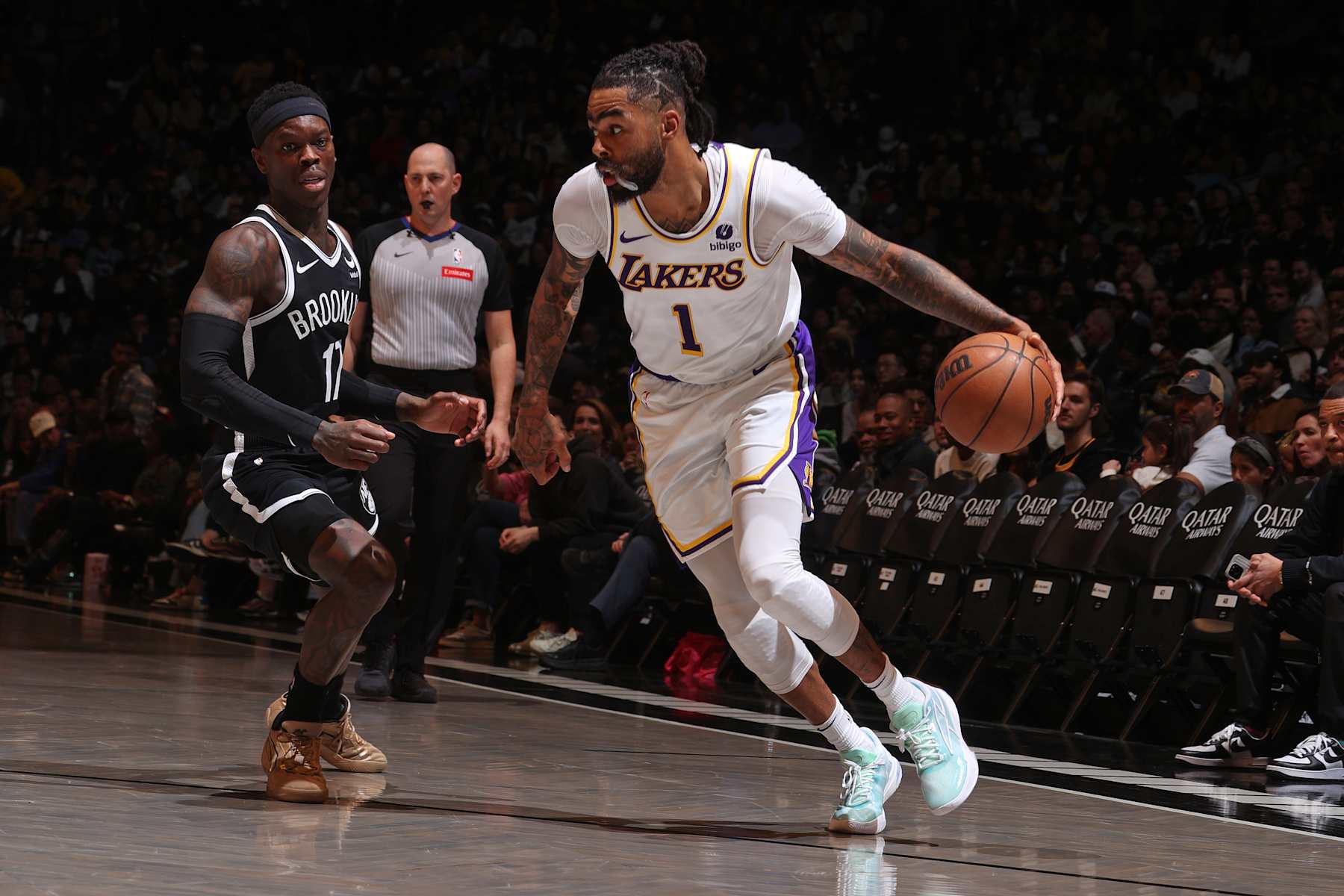 BROOKLYN, NY - MARCH 31: D'Angelo Russell #1 of the Los Angeles Lakers handles the ball against Dennis Schroder #17 of the Brooklyn Nets during the game on March 31, 2024 at Barclays Center in Brooklyn, New York. NOTE TO USER: User expressly acknowledges and agrees that, by downloading and or using this Photograph, user is consenting to the terms and conditions of the Getty Images License Agreement. Mandatory Copyright Notice: Copyright 2024 NBAE (Photo by Nathaniel S. Butler/NBAE via Getty Images)