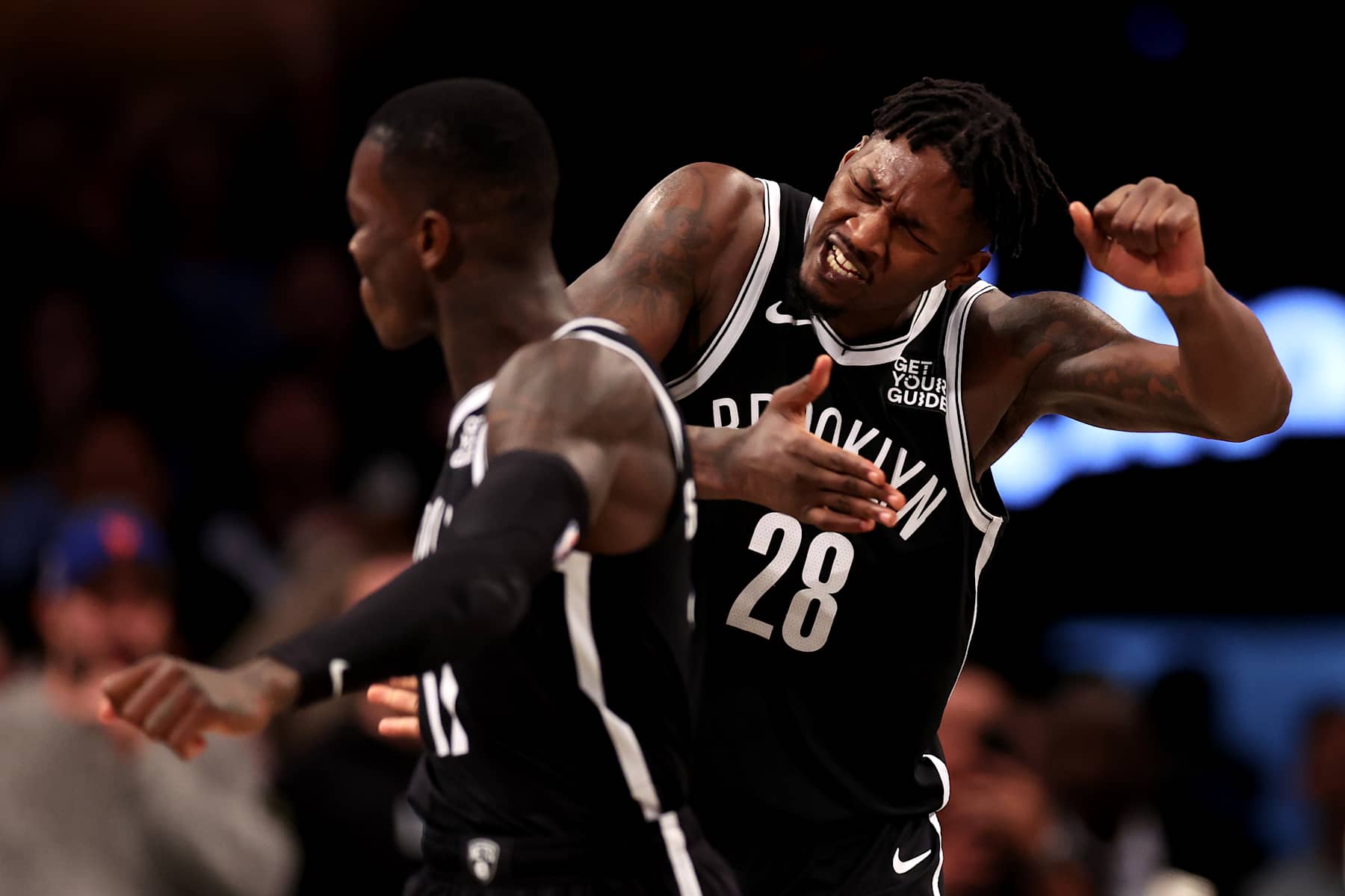NEW YORK, NEW YORK - NOVEMBER 04: Dennis Schroder #17 and Dorian Finney-Smith #28 of the Brooklyn Nets react after defeating the Memphis Grizzlies at Barclays Center on November 04, 2024 in the Brooklyn borough of New York City. (Photo by Luke Hales/Getty Images)