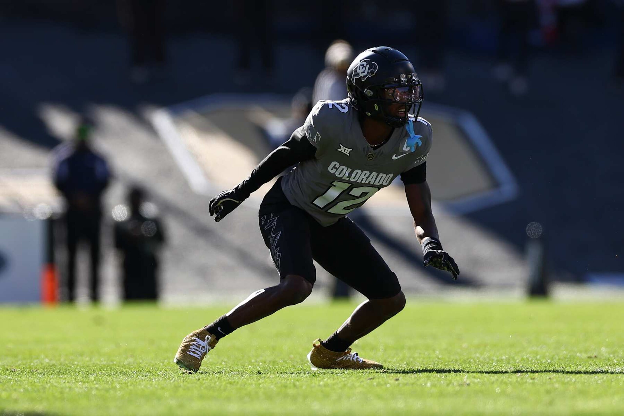 BOULDER, COLORADO - NOVEMBER 16: Travis Hunter #12 of the Colorado Buffaloes in coverage during the first half against the Utah Utes at Folsom Field on November 16, 2024 in Boulder, Colorado. (Photo by Aaron M. Sprecher/Getty Images)