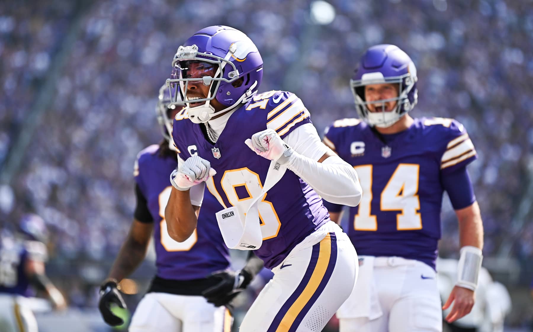 MINNEAPOLIS, MINNESOTA - SEPTEMBER 22: Justin Jefferson #18 of the Minnesota Vikings celebrates after scoring a touchdown in the first quarter of the game against the Houston Texans at U.S. Bank Stadium on September 22, 2024 in Minneapolis, Minnesota. (Photo by Stephen Maturen/Getty Images)