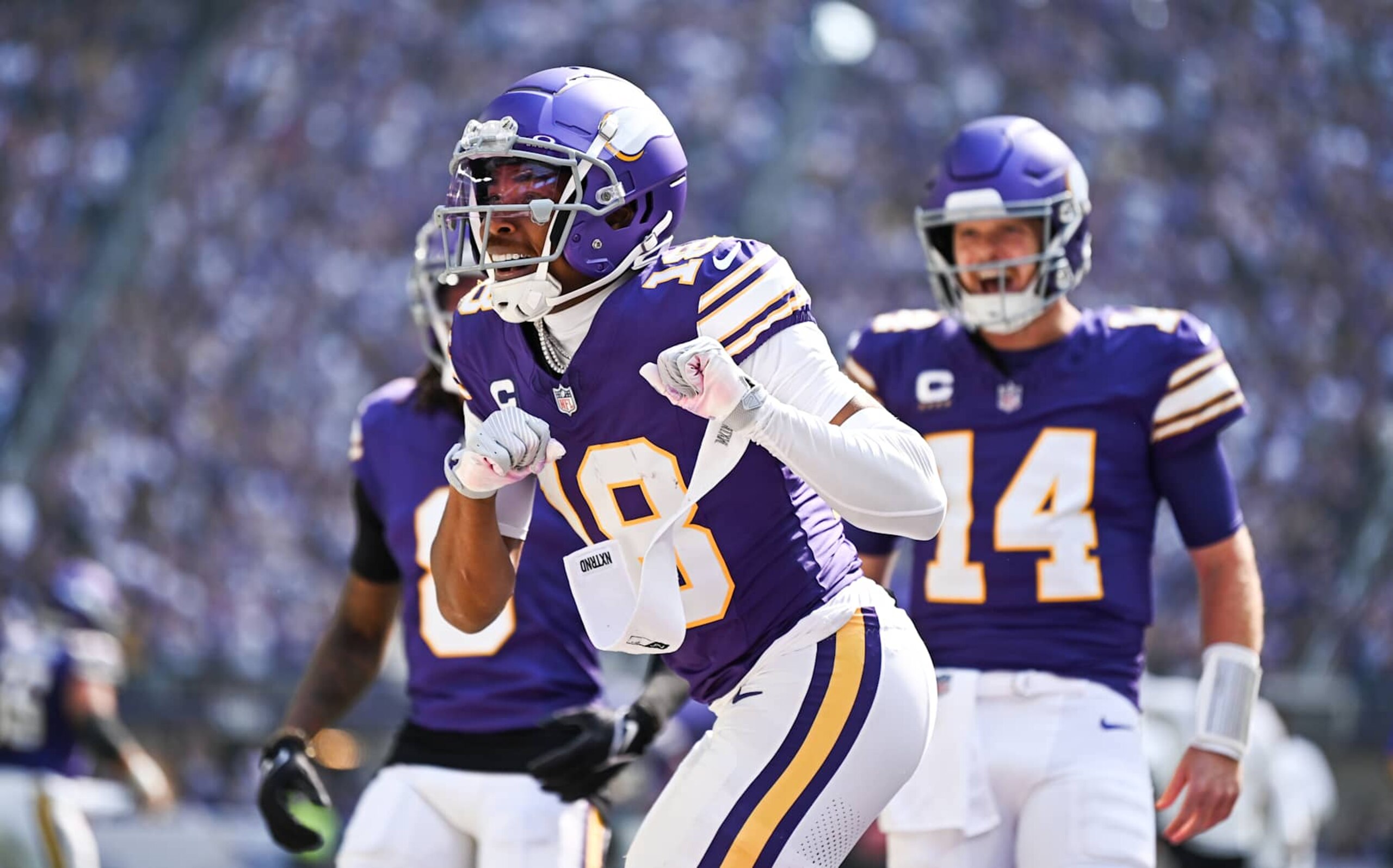 MINNEAPOLIS, MINNESOTA - SEPTEMBER 22: Justin Jefferson #18 of the Minnesota Vikings celebrates after scoring a touchdown in the first quarter of the game against the Houston Texans at U.S. Bank Stadium on September 22, 2024 in Minneapolis, Minnesota. (Photo by Stephen Maturen/Getty Images)