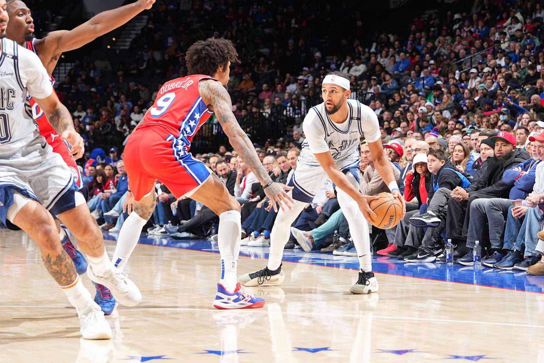 PHILADELPHIA, PA - DECEMBER 6: Jalen Suggs #4 of the Orlando Magic handles the ball during the game against the Philadelphia 76ers on December 6, 2024 at the Wells Fargo Center in Philadelphia, Pennsylvania NOTE TO USER: User expressly acknowledges and agrees that, by downloading and/or using this Photograph, user is consenting to the terms and conditions of the Getty Images License Agreement. Mandatory Copyright Notice: Copyright 2024 NBAE (Photo by Jesse D. Garrabrant/NBAE via Getty Images)