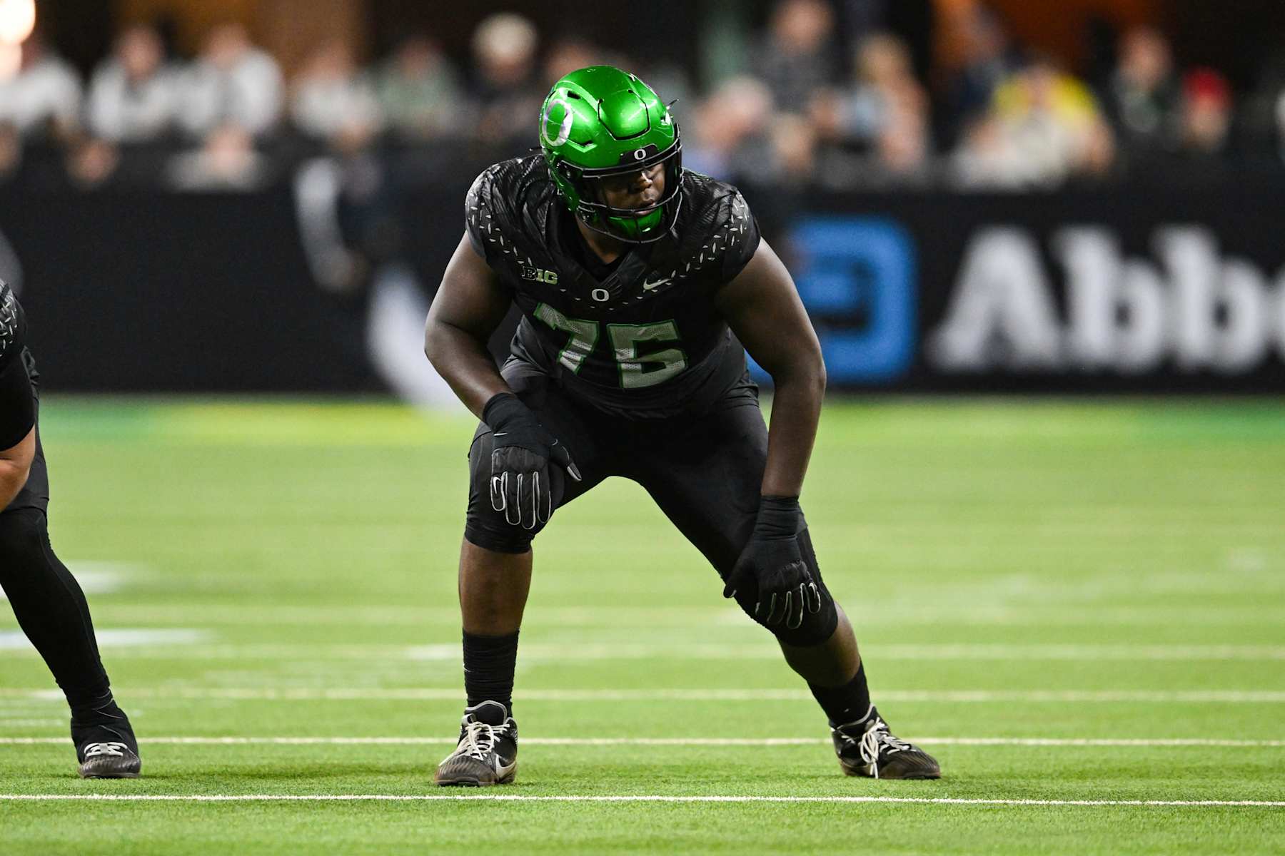 INDIANAPOLIS, IN - DECEMBER 07: Oregon Ducks OL Josh Conerly Jr. (76) blocks during the Big Ten Championship football game between the Penn State Nittany Lions and the Oregon Ducks on December 7, 2024 at Lucas Oil Stadium in Indianapolis, IN (Photo by James Black/Icon Sportswire via Getty Images)