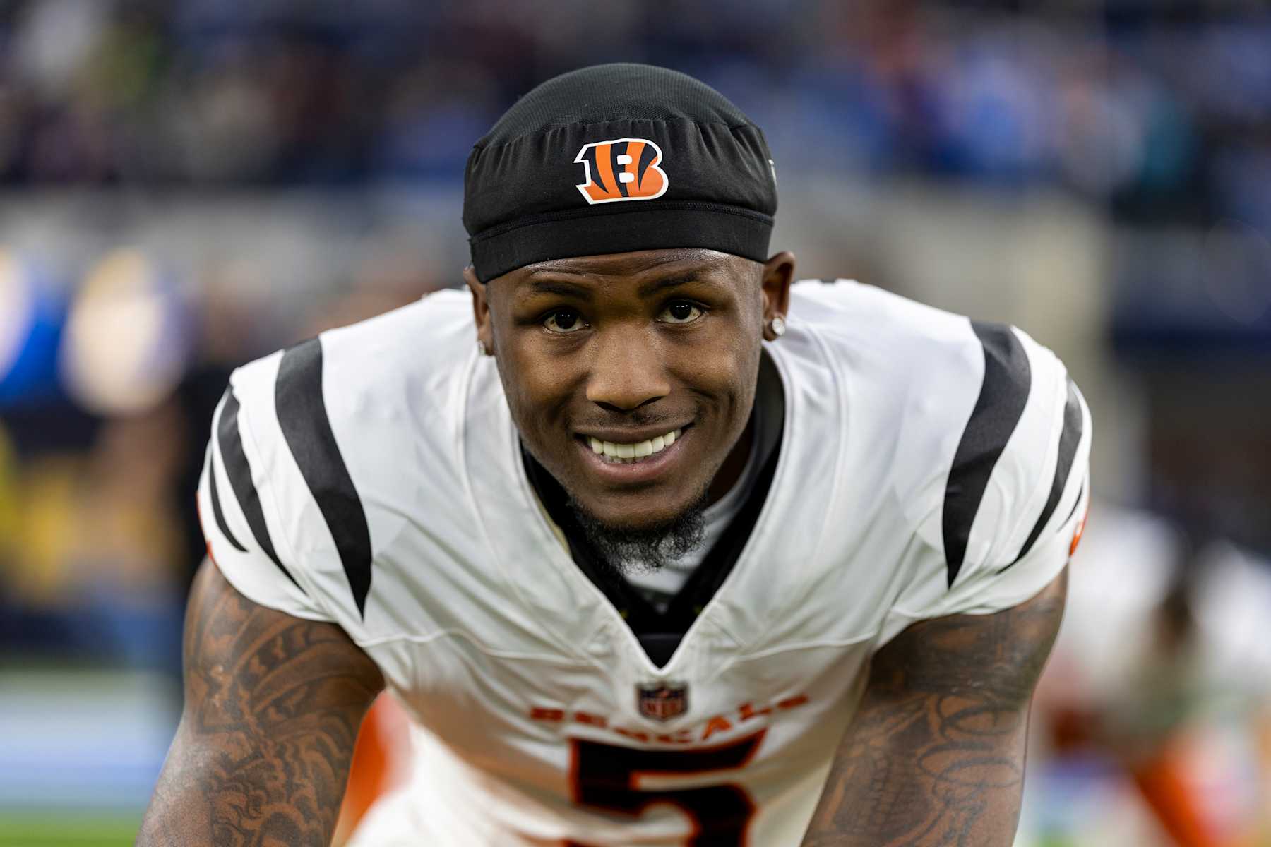 INGLEWOOD, CALIFORNIA - NOVEMBER 17: Tee Higgins #5 of the Cincinnati Bengals reacts as he he stretches during an NFL Football game against the Los Angeles Chargers at SoFi Stadium on November 17, 2024 in Inglewood, California. (Photo by Michael Owens/Getty Images)