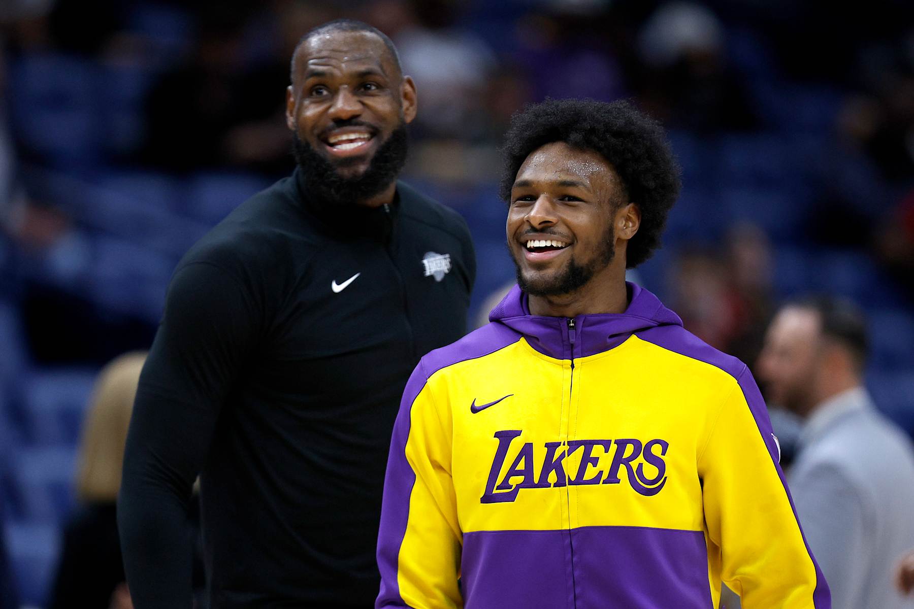 NEW ORLEANS, LOUISIANA - NOVEMBER 16: LeBron James #23 of the Los Angeles Lakers and Bronny James #9 of the Los Angeles Lakers stand on the court prior to the start of an NBA game against the New Orleans Pelicans at Smoothie King Center on November 16, 2024 in New Orleans, Louisiana. NOTE TO USER: User expressly acknowledges and agrees that, by downloading and or using this photograph, User is consenting to the terms and conditions of the Getty Images License Agreement. (Photo by Sean Gardner/Getty Images)