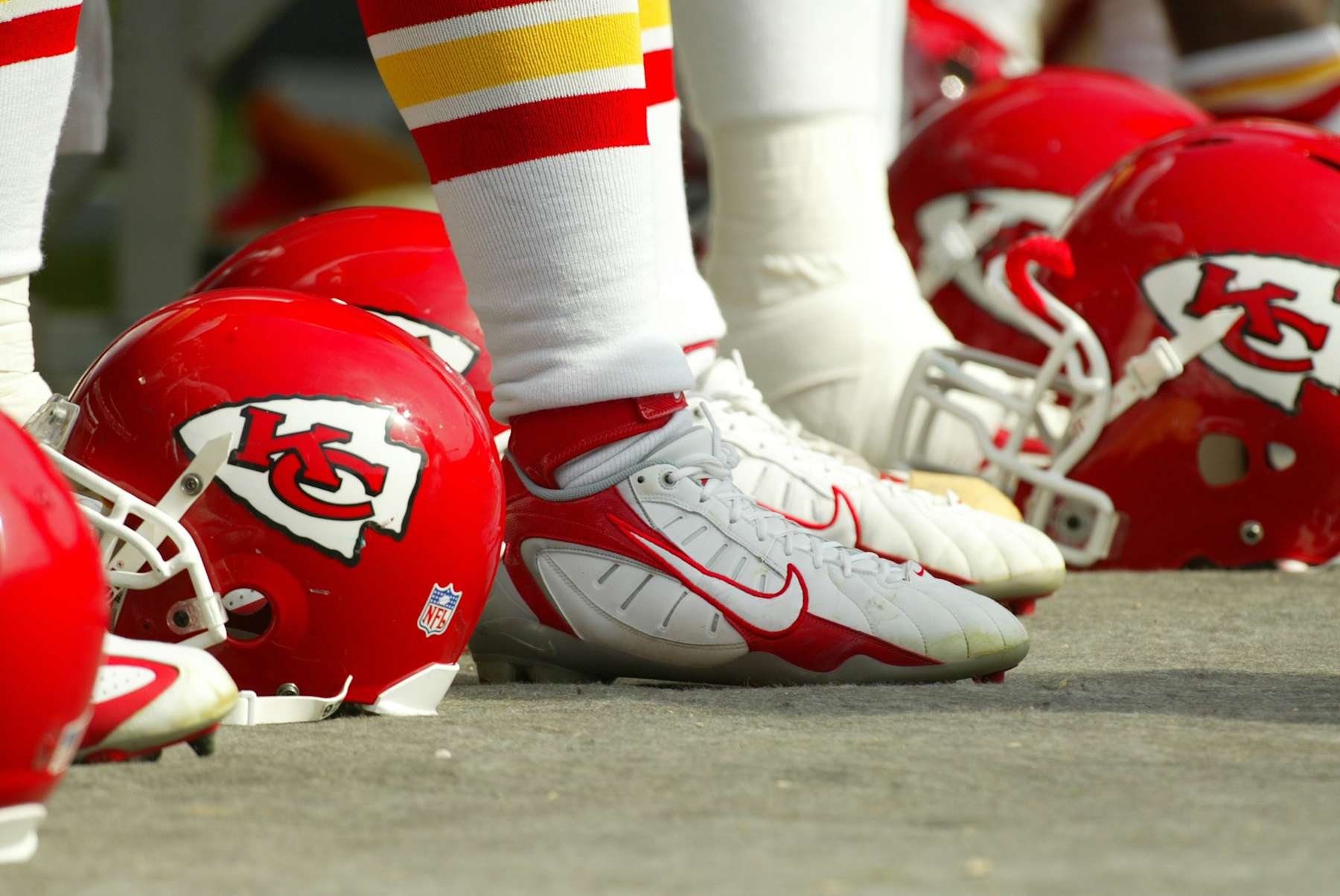 MIAMI - NOVEMBER 12: A general view of shoes and a helmet before the game between the Kansas City Chiefs and the Miami Dolphins at Dolphin Stadium on November 12, 2006 in Miami, Florida. The Dolphins defeated the Chiefs 13-10. (Photo by Ronald C. Modra/Getty Images)