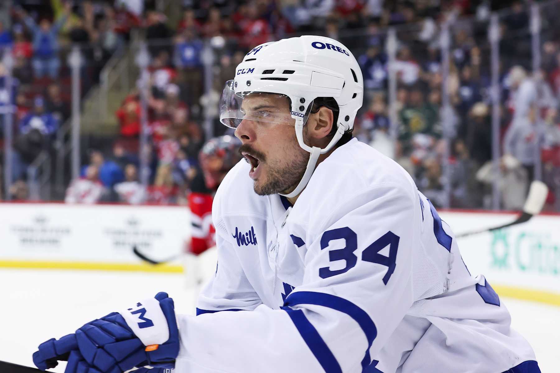 NEWARK, NJ - DECEMBER 10: Toronto Maple Leafs center Auston Matthews (34) celebrates after scoring a goal in overtime of NHL game between the Toronto Maple Leafs and New Jersey Devils at Prudential Center on December 10, 2024 in Newark, New Jersey. (Photo by Andrew Mordzynski/Icon Sportswire via Getty Images)
