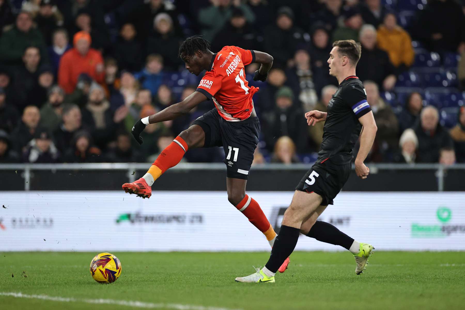 LUTON, ENGLAND - DECEMBER 10: Elijah Adebayo of Luton Town scores his team's first goal during the Sky Bet Championship match between Luton Town FC and Stoke City FC at Kenilworth Road on December 10, 2024 in Luton, England. (Photo by David Rogers/Getty Images)