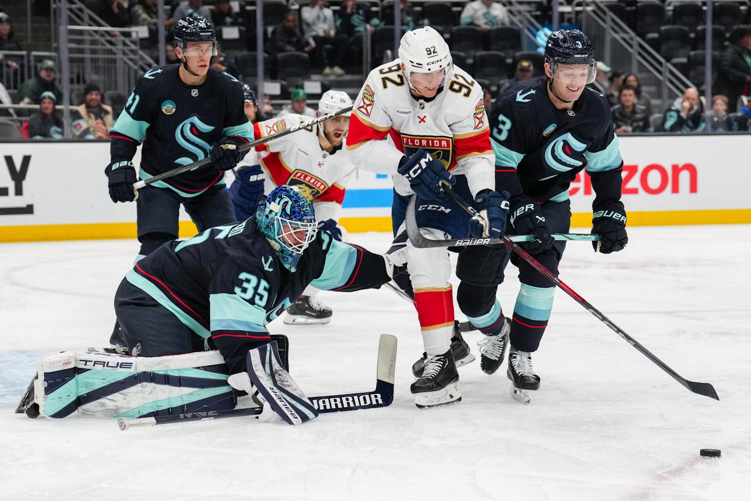 SEATTLE, WASHINGTON - DECEMBER 10: Tomas Nosek #92 of the Florida Panthers moves the puck through heavy defense during the second period of a game against the Seattle Kraken at Climate Pledge Arena on December 10, 2024 in Seattle, Washington. (Photo by Christopher Mast/NHLI via Getty Images) SEATTLE, WASHINGTON - DECEMBER 10: Tomas Nosek #92 of the Florida Panthers moves the puck through heavy defense during the second period of a game against the Seattle Kraken at Climate Pledge Arena on December 10, 2024 in Seattle, Washington. (Photo by Christopher Mast/NHLI via Getty Images)