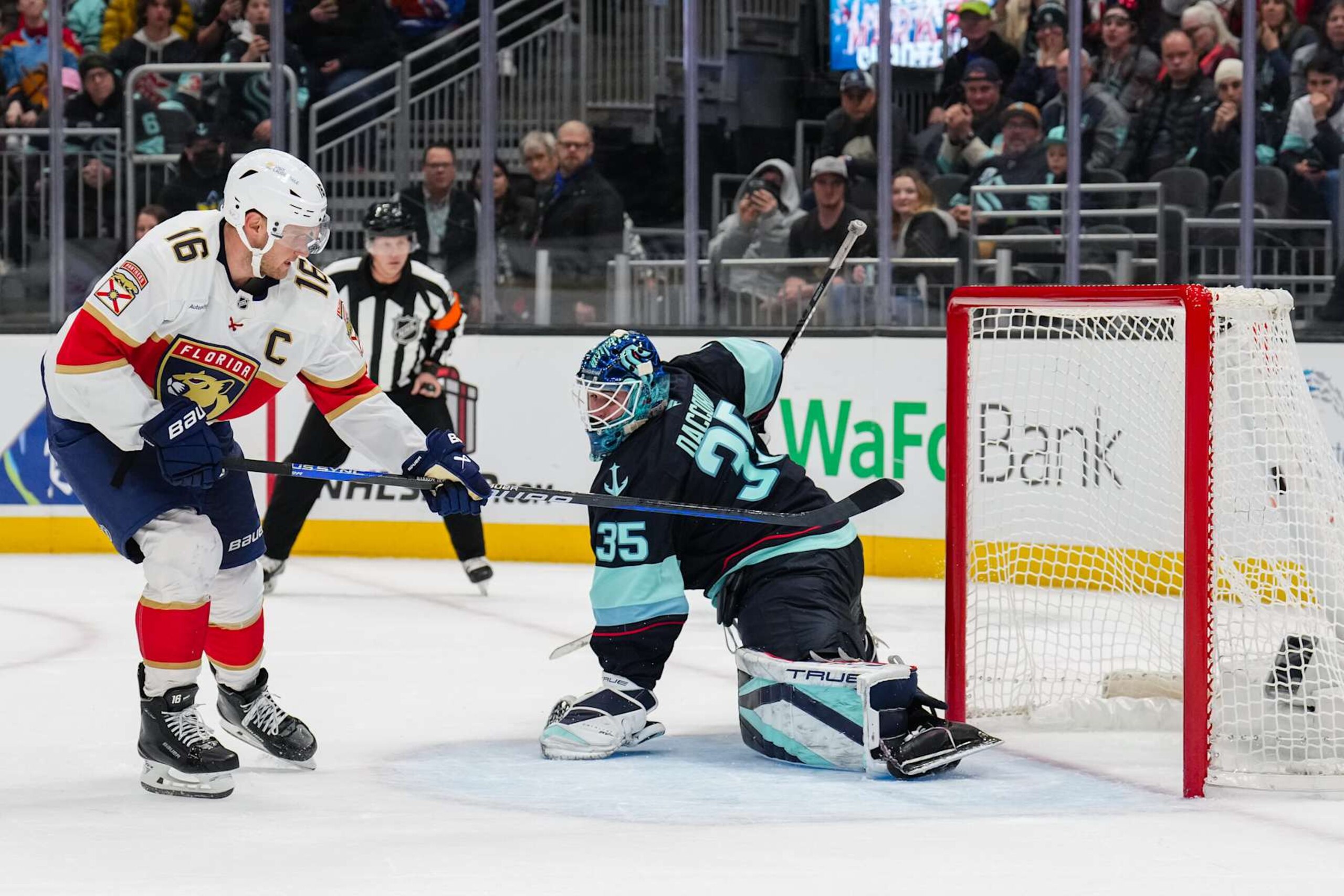 SEATTLE, WASHINGTON - DECEMBER 10: Aleksander Barkov #16 of the Florida Panthers scores a goal during the shoot out period of a game against the Seattle Kraken at Climate Pledge Arena on December 10, 2024 in Seattle, Washington. (Photo by Christopher Mast/NHLI via Getty Images) SEATTLE, WASHINGTON - DECEMBER 10: Aleksander Barkov #16 of the Florida Panthers scores a goal during the shoot out period of a game against the Seattle Kraken at Climate Pledge Arena on December 10, 2024 in Seattle, Washington. (Photo by Christopher Mast/NHLI via Getty Images)