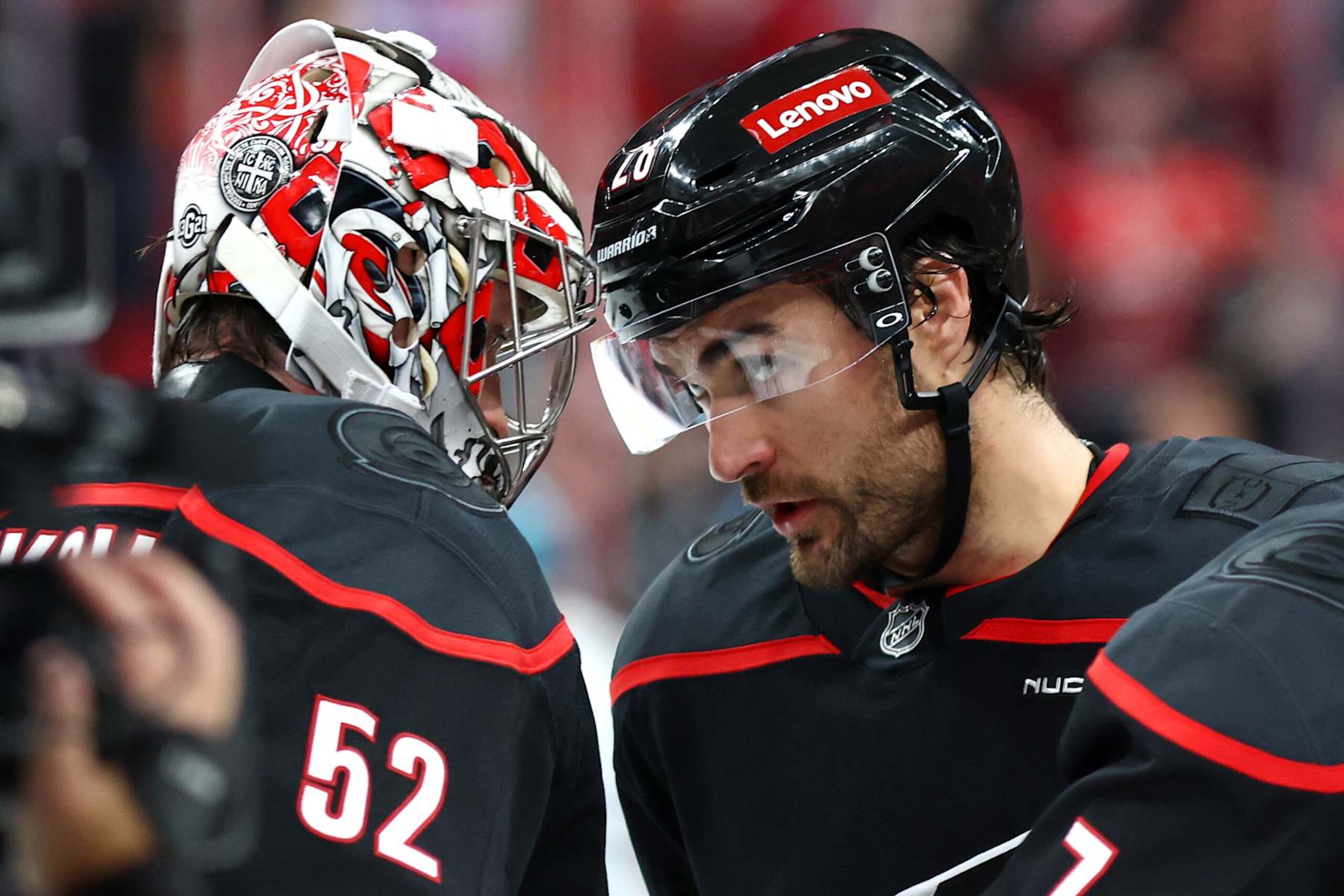 RALEIGH, NORTH CAROLINA - DECEMBER 10: Pyotr Kochetkov #52 of the Carolina Hurricanes is congratulated by teammate William Carrier #28 following their 3-2 victory over the San Jose Sharks at Lenovo Center on December 10, 2024 in Raleigh, North Carolina. (Photo by Jared C. Tilton/Getty Images) RALEIGH, NORTH CAROLINA - DECEMBER 10: Pyotr Kochetkov #52 of the Carolina Hurricanes is congratulated by teammate William Carrier #28 following their 3-2 victory over the San Jose Sharks at Lenovo Center on December 10, 2024 in Raleigh, North Carolina. (Photo by Jared C. Tilton/Getty Images)