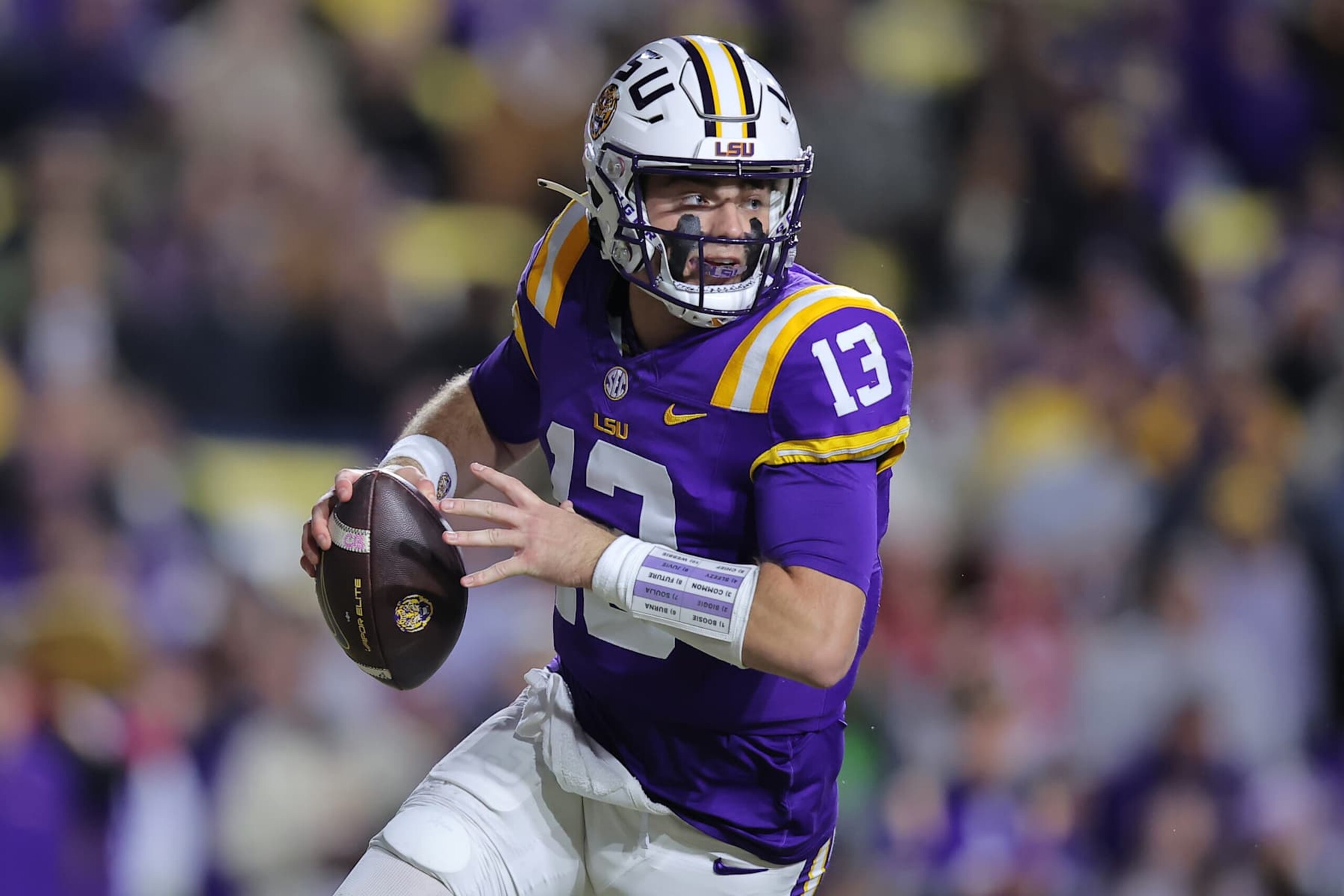BATON ROUGE, LOUISIANA - NOVEMBER 30: Garrett Nussmeier #13 of the LSU Tigers throws the ball against the Oklahoma Sooners during a game at Tiger Stadium on November 30, 2024 in Baton Rouge, Louisiana. (Photo by Jonathan Bachman/Getty Images)