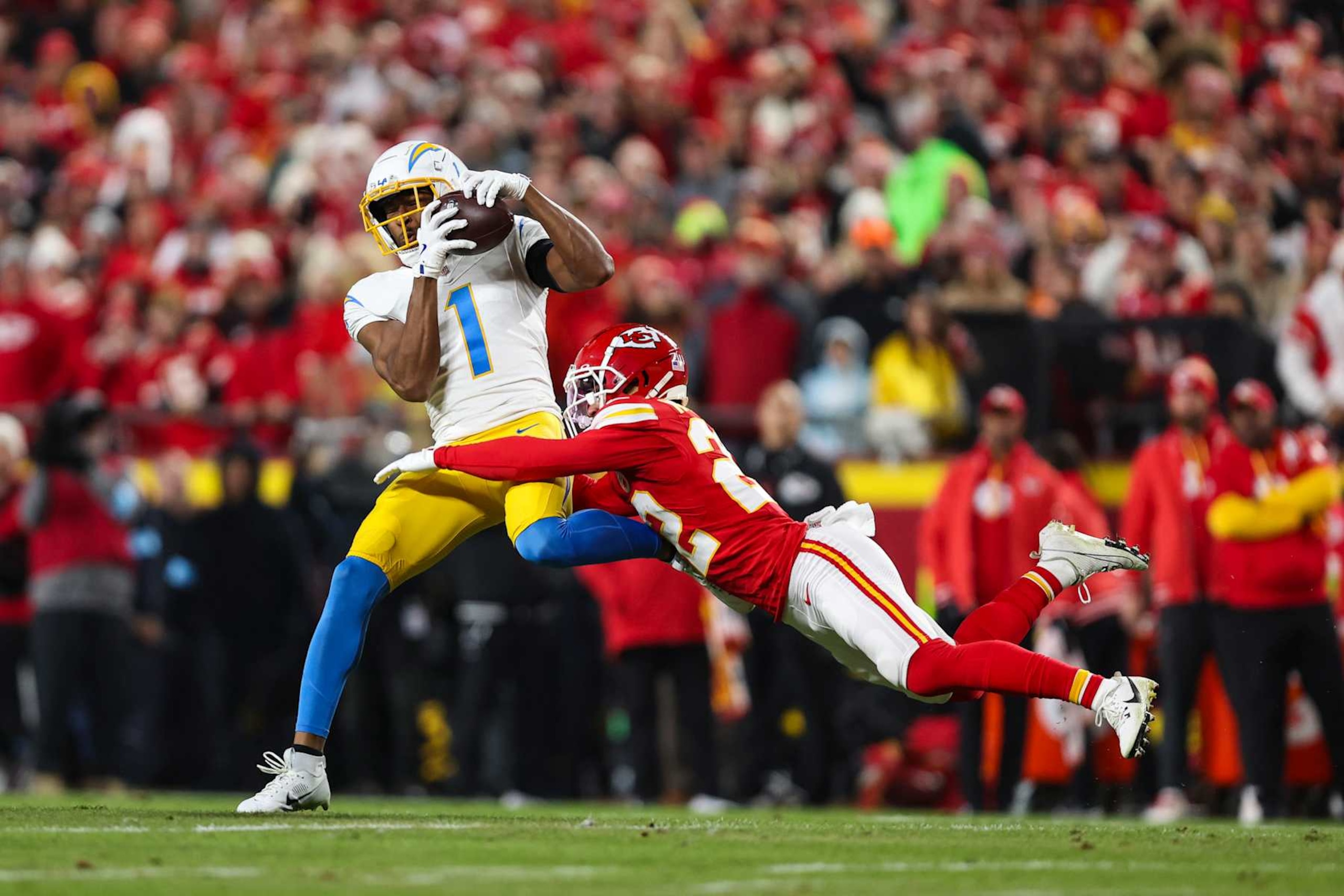 KANSAS CITY, MISSOURI - DECEMBER 08: Quentin Johnston #1 of the Los Angeles Chargers makes a catch during an NFL football game against the Kansas City Chiefs at GEHA Field at Arrowhead Stadium on December 8, 2024 in Kansas City, Missouri. (Photo by Perry Knotts/Getty Images)