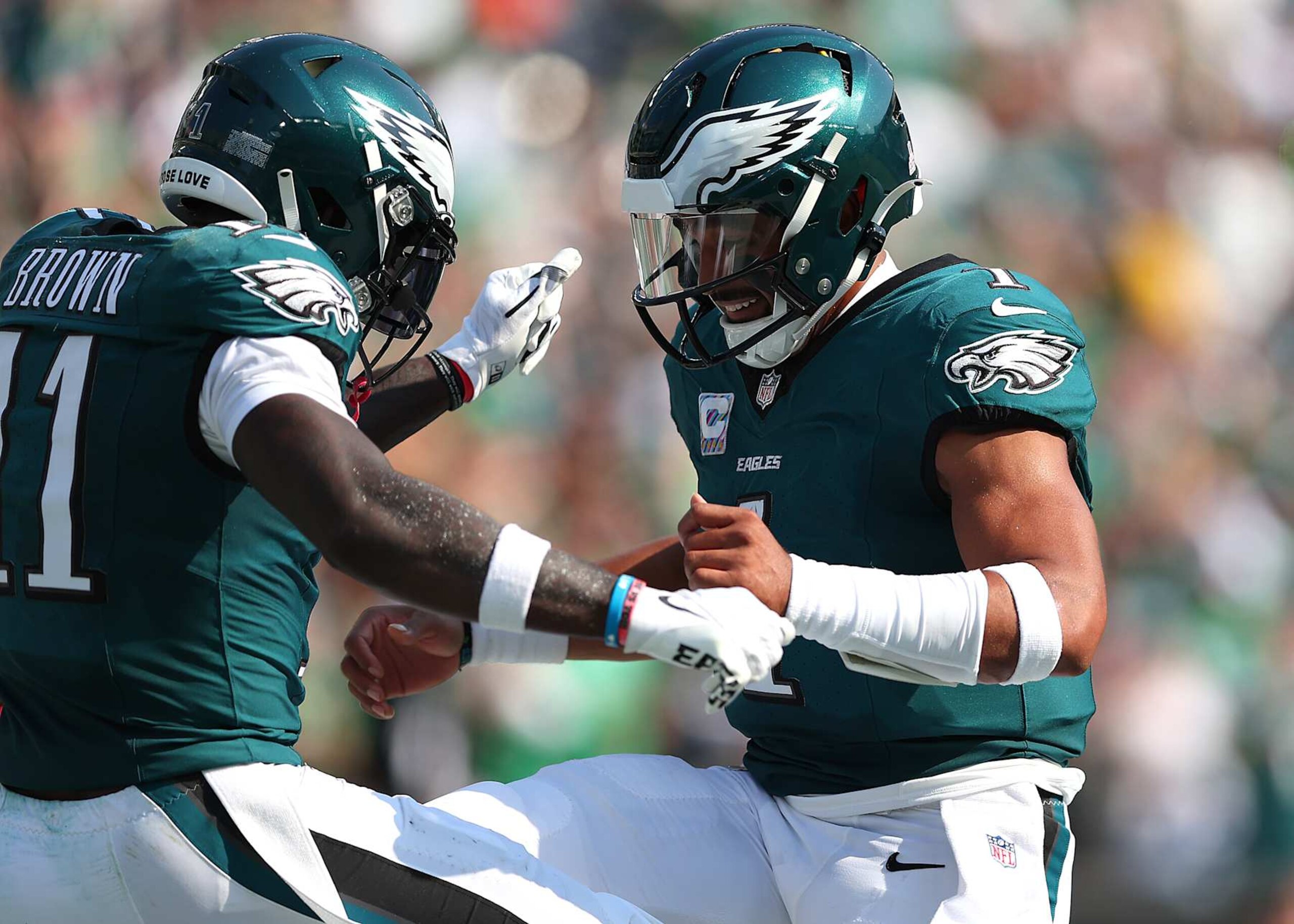 PHILADELPHIA, PENNSYLVANIA - OCTOBER 13: A.J. Brown #11 of the Philadelphia Eagles celebrates scoring a touchdown thrown by Jalen Hurts #1 during the second quarter against the Cleveland Browns at Lincoln Financial Field on October 13, 2024 in Philadelphia, Pennsylvania. (Photo by Heather Barry/Getty Images)