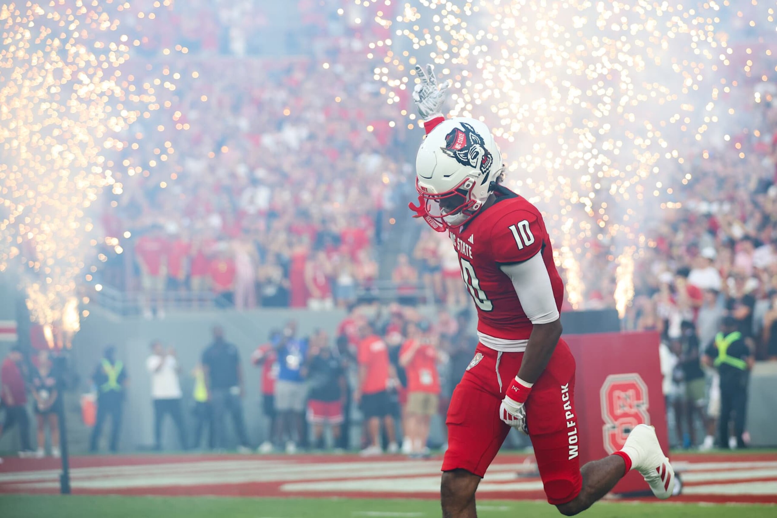 RALEIGH, NC - AUGUST 29: NC State Wolfpack wide receiver Kevin "KC" Concepcion (10) runs out during the college football game between the NC State Wolfpack and the Western Carolina Catamounts on August 29, 2024 at Carter-Finley Stadium in Raleigh, NC. (Photo by Nicholas Faulkner/Icon Sportswire via Getty Images)