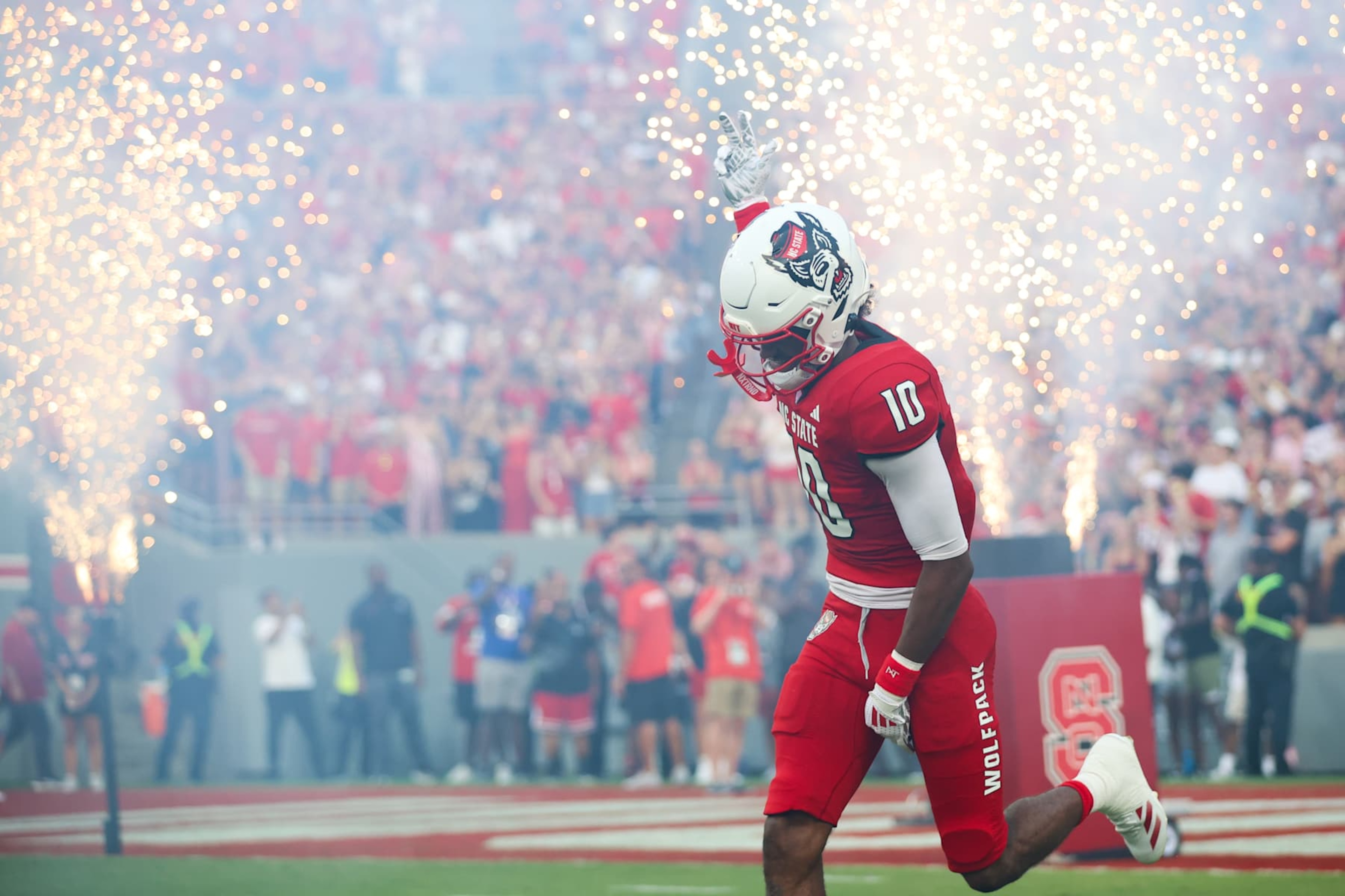 RALEIGH, NC - AUGUST 29: NC State Wolfpack wide receiver Kevin "KC" Concepcion (10) runs out during the college football game between the NC State Wolfpack and the Western Carolina Catamounts on August 29, 2024 at Carter-Finley Stadium in Raleigh, NC. (Photo by Nicholas Faulkner/Icon Sportswire via Getty Images)