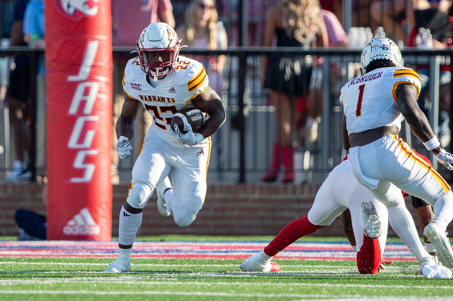 MOBILE, ALABAMA - OCTOBER 26: Running back Ahmad Hardy #22 of the Louisiana Monroe Warhawks runs the ball downfield during their game against the South Alabama Jaguars at Hancock Whitney Stadium on October 26, 2024 in Mobile, Alabama. (Photo by Michael Chang/Getty Images)