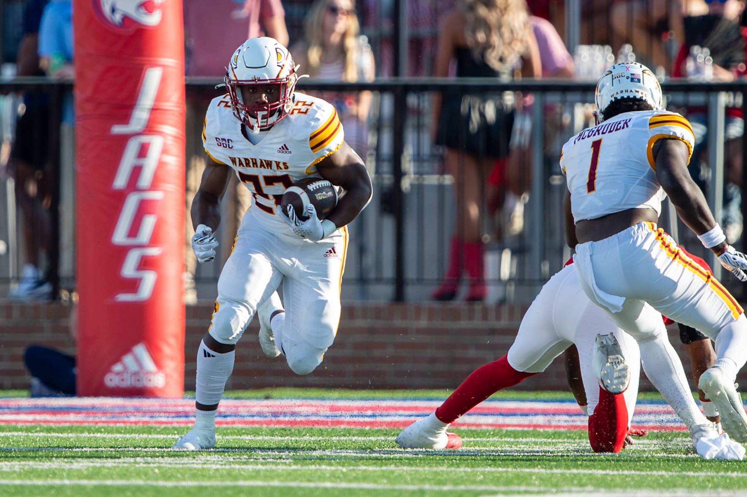 MOBILE, ALABAMA - OCTOBER 26: Running back Ahmad Hardy #22 of the Louisiana Monroe Warhawks runs the ball downfield during their game against the South Alabama Jaguars at Hancock Whitney Stadium on October 26, 2024 in Mobile, Alabama. (Photo by Michael Chang/Getty Images)