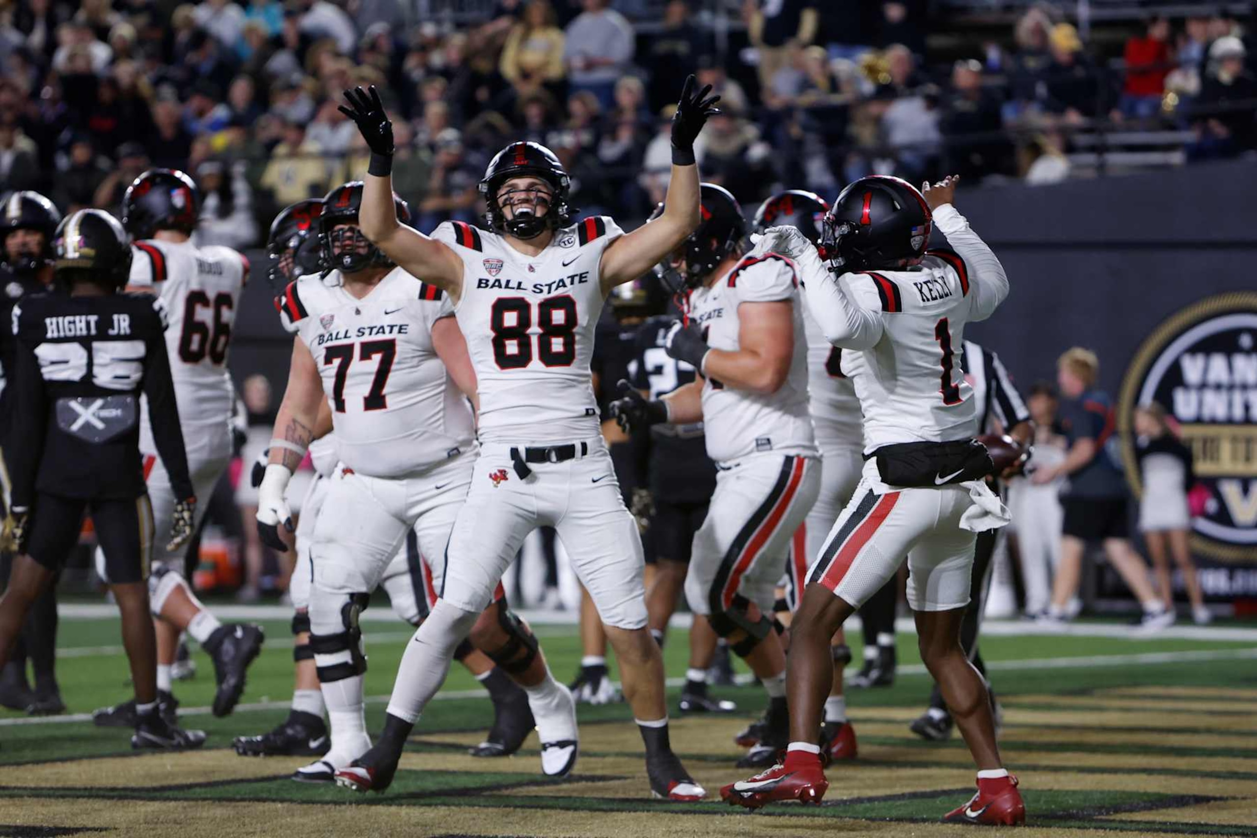NASHVILLE, TN - OCTOBER 19: Ball State Cardinals tight end Tanner Koziol (88) celebrates a touchdown with Ball State Cardinals defensive back Kiael Kelly (1) during a game between the Vanderbilt Commodores and Ball State Cardinals, October 19, 2024 at FirstBank Stadium in Nashville, Tennessee.  (Photo by Matthew Maxey/Icon Sportswire via Getty Images)