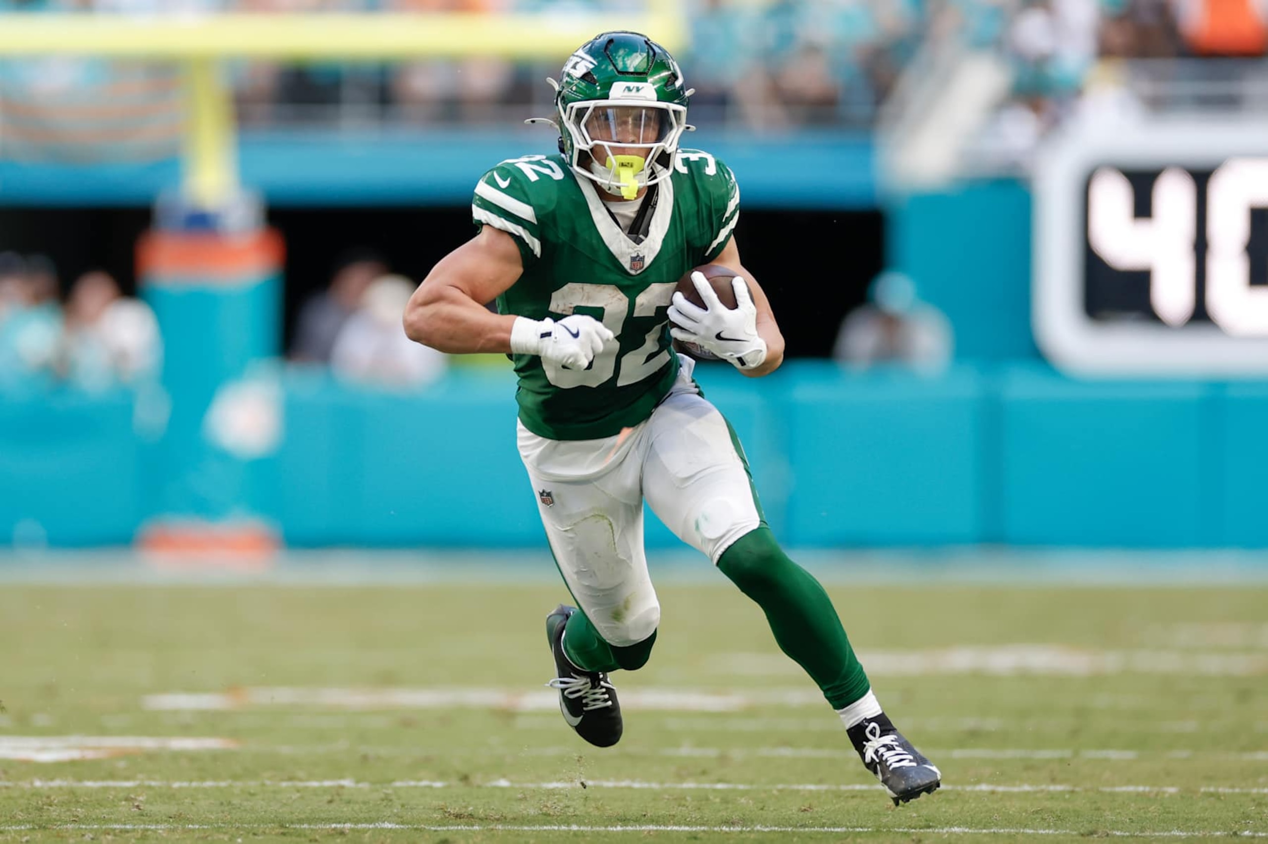 MIAMI GARDENS, FL - DECEMBER 08: New York Jets running back Isaiah Davis (32) runs with the ball during the game between the Miami Dolphins and the New York Jets on December 8, 2024 at Hard Rock Stadium in Miami Gardens, Fl. (Photo by David Rosenblum/Icon Sportswire via Getty Images)