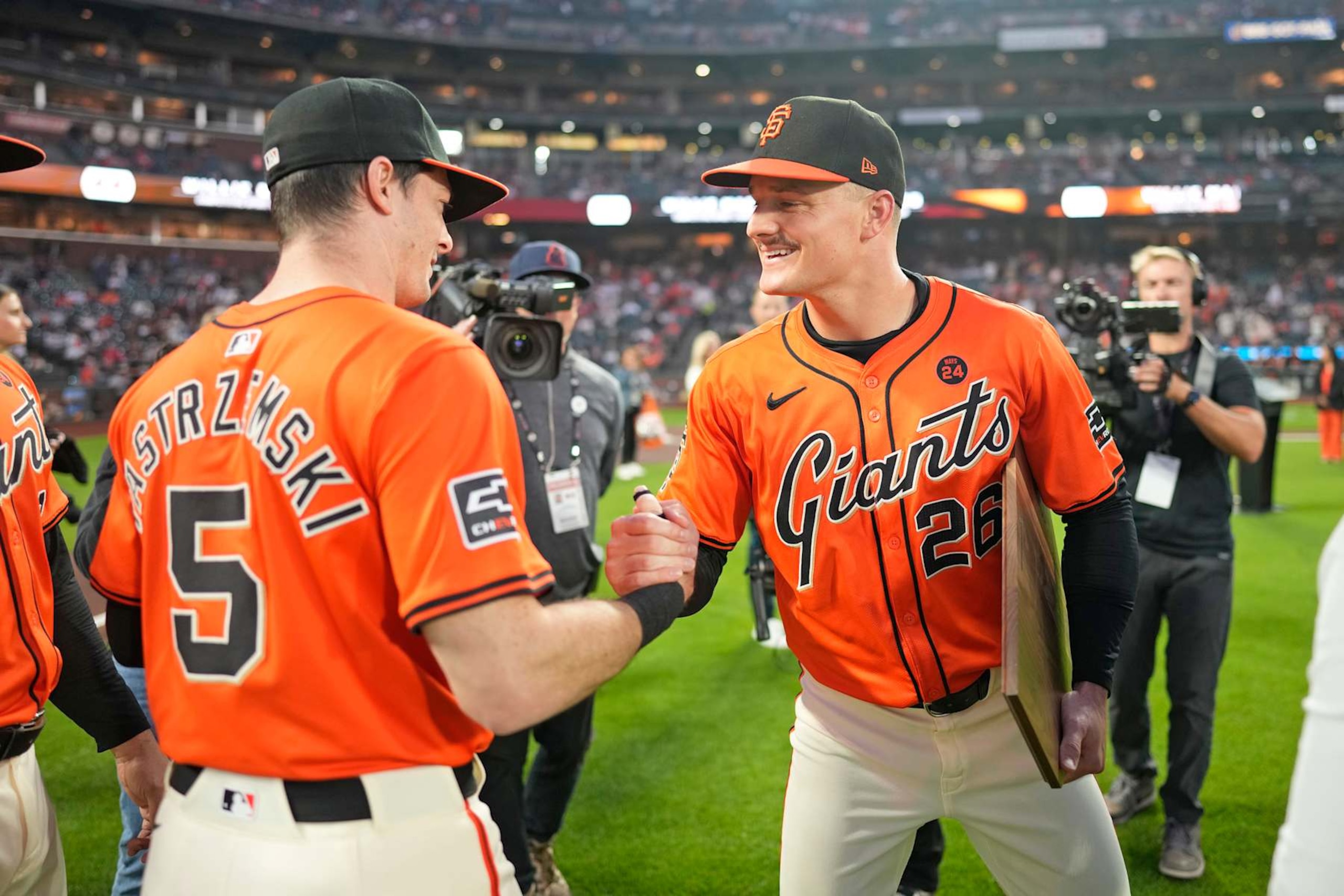 Mike Yastrzemski (L) and Matt Chapman (R)