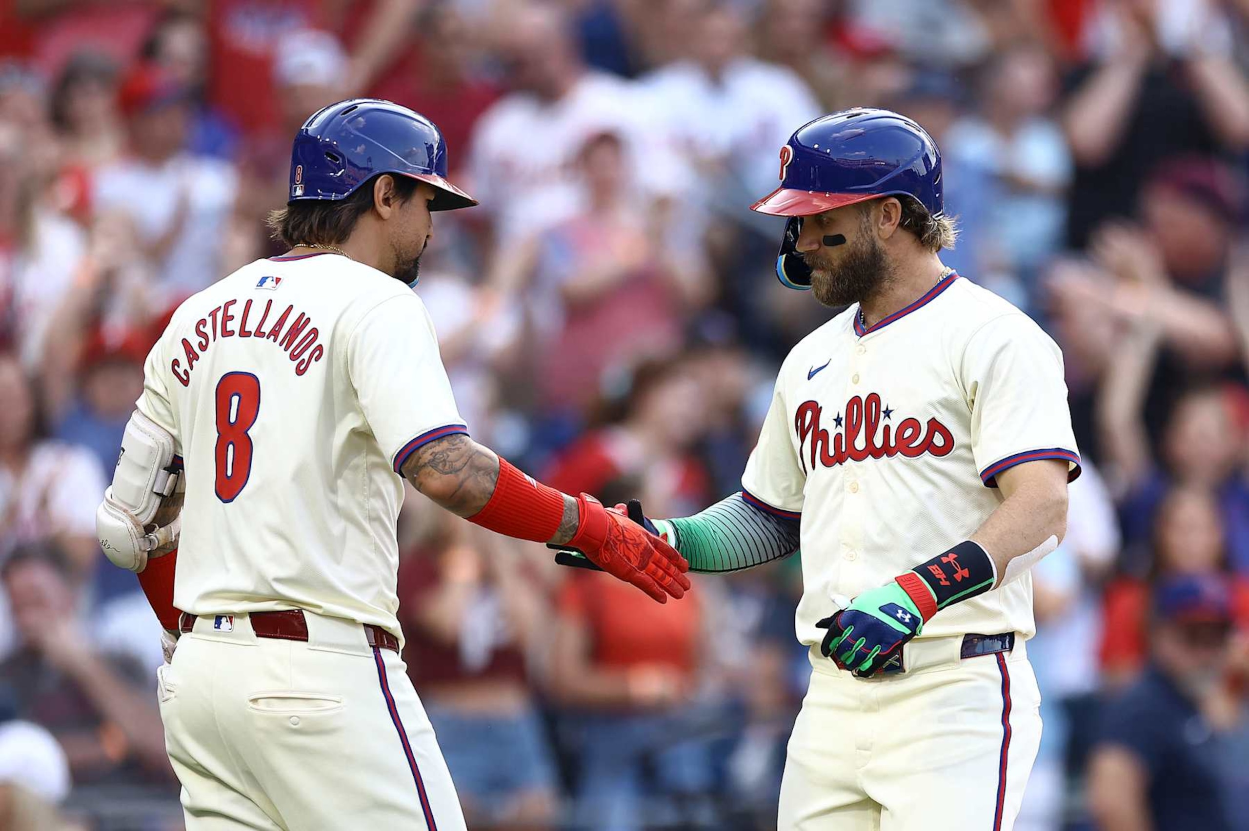 Nick Castellanos (L) and Bryce Harper (R)