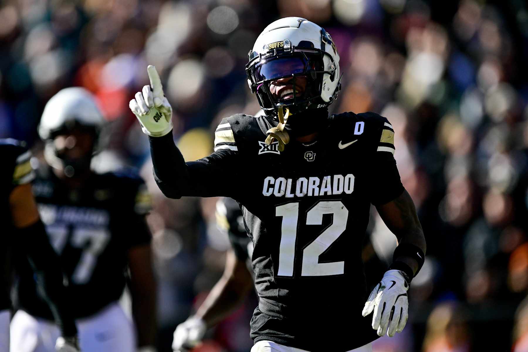 BOULDER, CO - NOVEMBER 29:  Travis Hunter #12 of the Colorado Buffaloes celebrates after a score in the third quarter against the Oklahoma State Cowboys at Folsom Field on November 29, 2024 in Boulder, Colorado. (Photo by Dustin Bradford/Getty Images)
