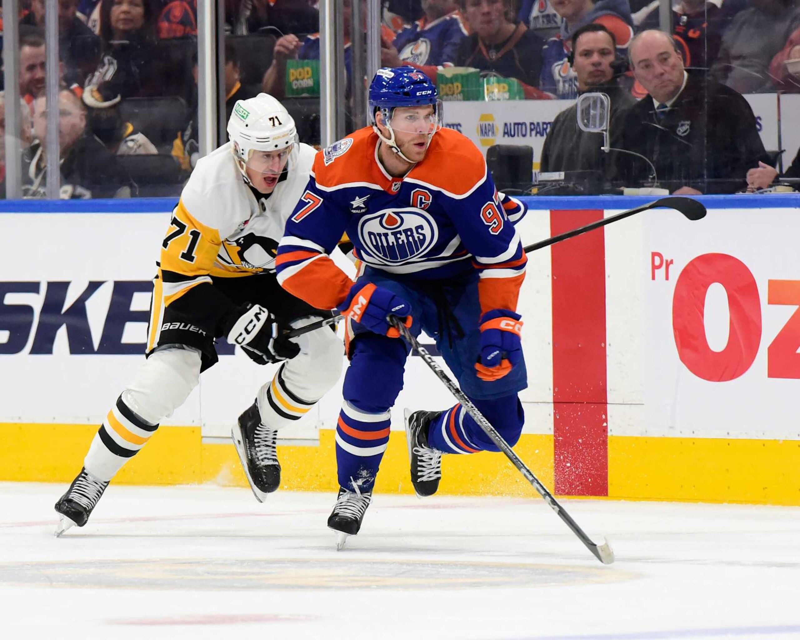 Edmonton Oilers captain Connor McDavid being pursued by Pittsburgh Penguins center Evgeni Malkin. Edmonton Oilers captain Connor McDavid being pursued by Pittsburgh Penguins center Evgeni Malkin.