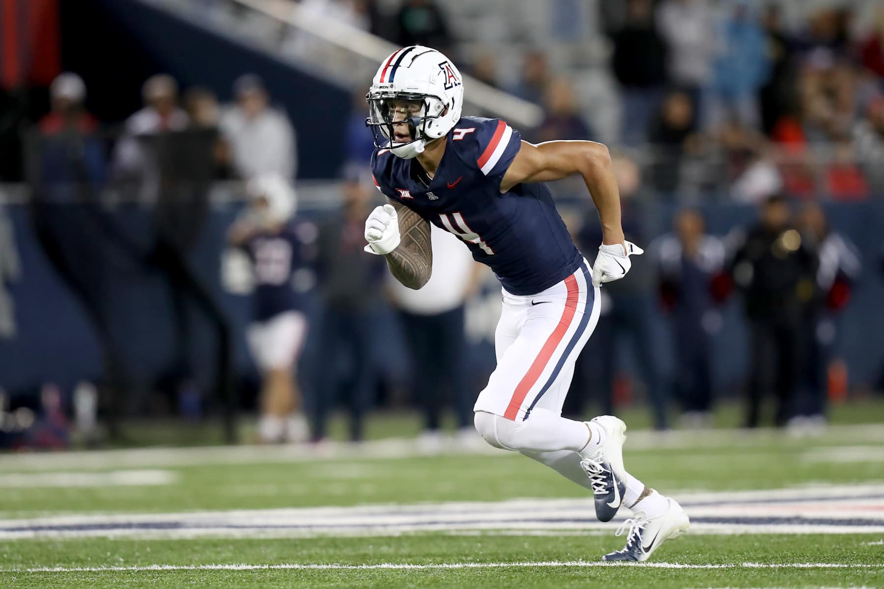 TUCSON, AZ - NOVEMBER 15: Arizona Wildcats wide receiver Tetairoa McMillan #4 during a football game between the University of Houston Cougars and the University of Arizona Wildcats.  November 15, 2024 at Arizona Stadium in Tucson, AZ. (Photo by Christopher Hook/Icon Sportswire via Getty Images)