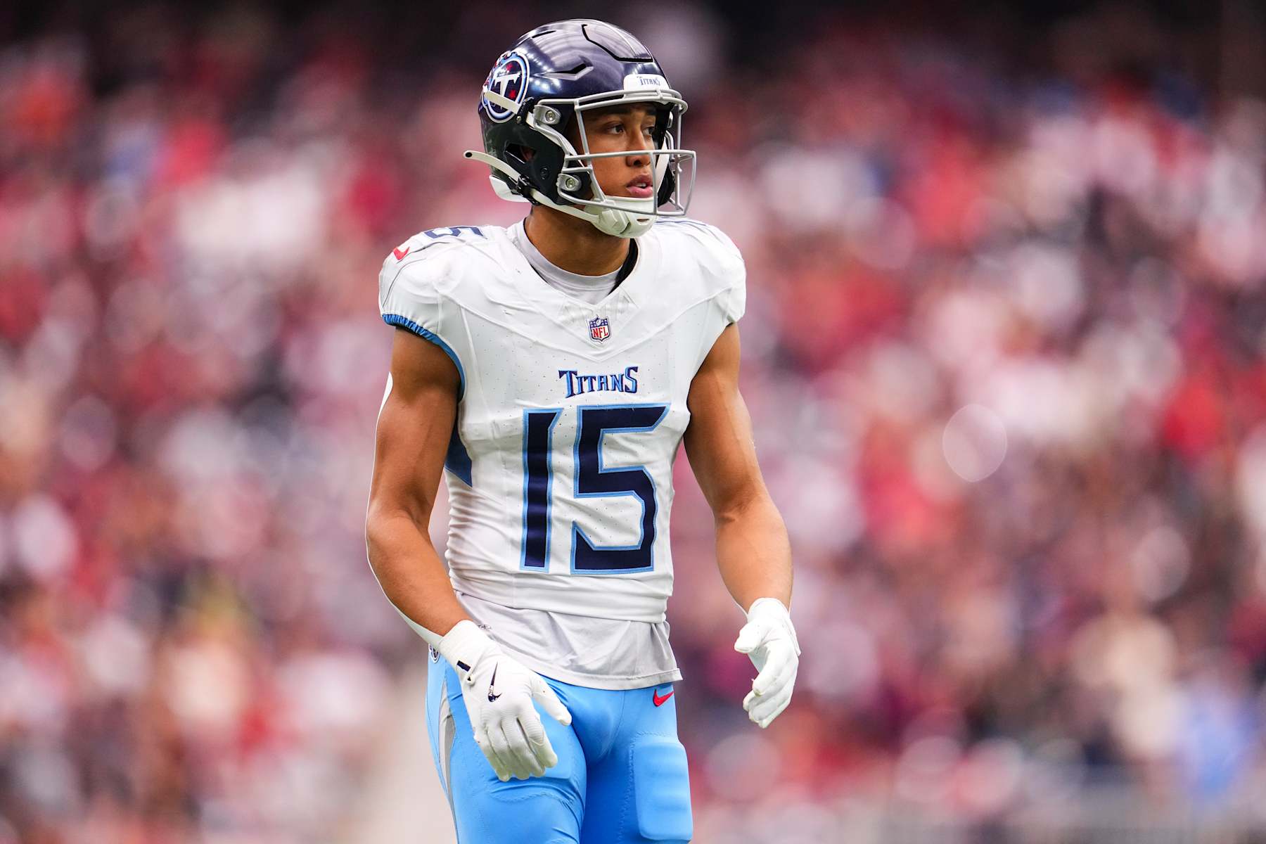 HOUSTON, TX - NOVEMBER 24: Nick Westbrook-Ikhine #15 of the Tennessee Titans looks on from the field during an NFL football game against the Houston Texans at NRG Stadium on November 24, 2024 in Houston, Texas. (Photo by Cooper Neill/Getty Images)