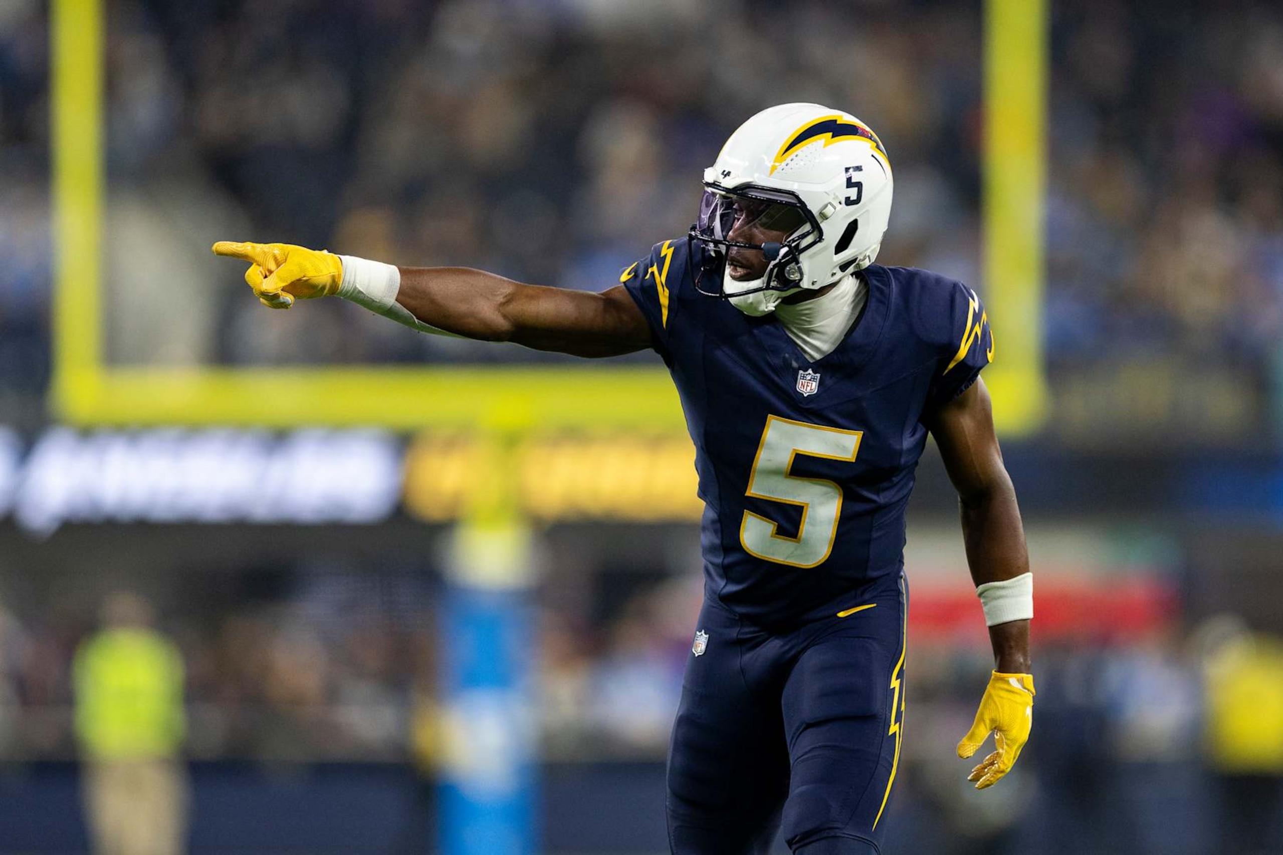 INGLEWOOD, CALIFORINA - NOVEMBER 25: Joshua Palmer #5 of the Los Angeles Chargers signals during an NFL Football game against the Baltimore Ravens at SoFi Stadium on November 25, 2024 in Inglewood, Califorina. (Photo by Michael Owens/Getty Images)