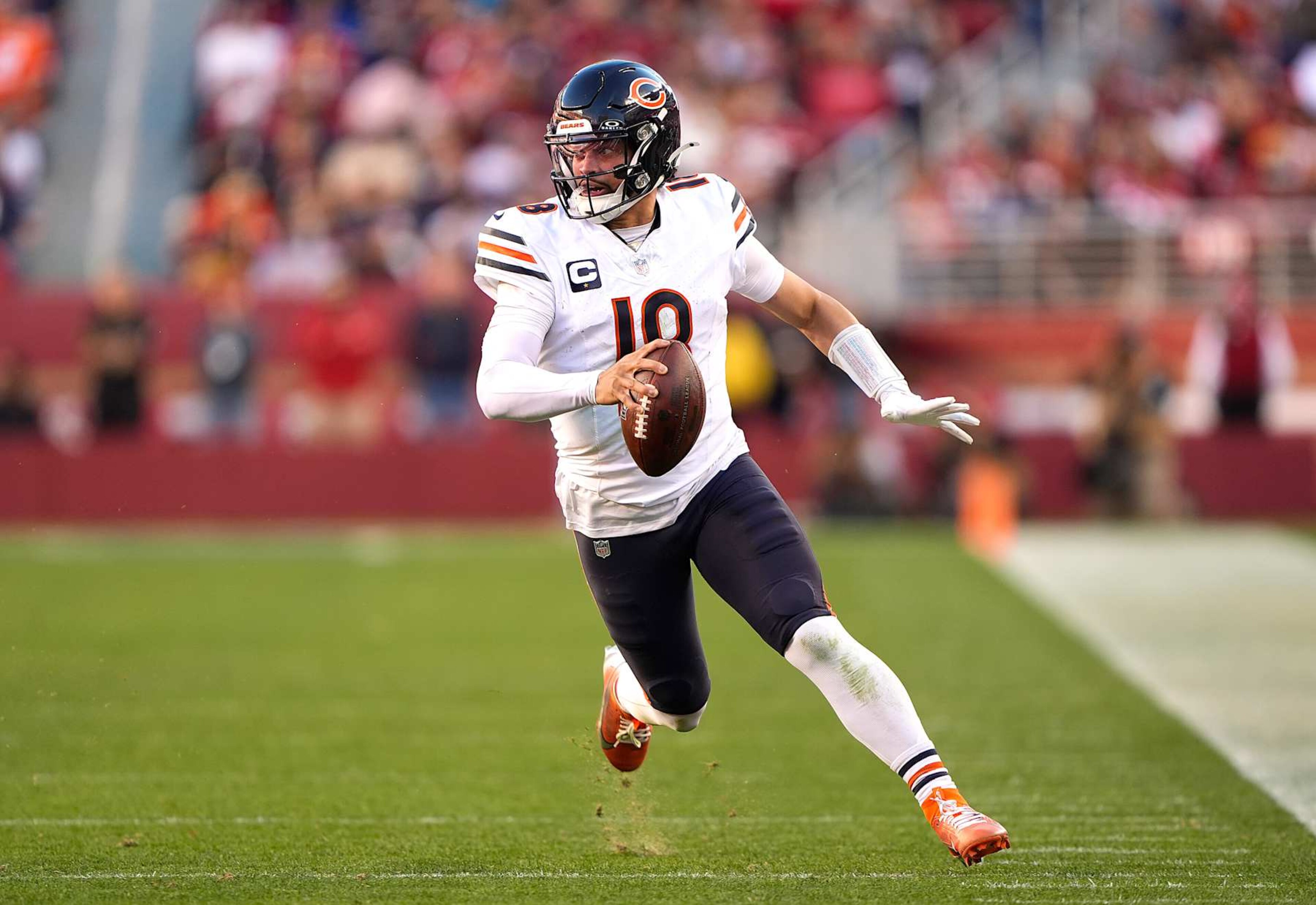 SANTA CLARA, CALIFORNIA - DECEMBER 08: Caleb Williams #18 of the Chicago Bears runs with the ball against the San Francisco 49ers in the fourth quarter at Levi's Stadium on December 08, 2024 in Santa Clara, California. (Photo by Thearon W. Henderson/Getty Images) SANTA CLARA, CALIFORNIA - DECEMBER 08: Caleb Williams #18 of the Chicago Bears runs with the ball against the San Francisco 49ers in the fourth quarter at Levi's Stadium on December 08, 2024 in Santa Clara, California. (Photo by Thearon W. Henderson/Getty Images)