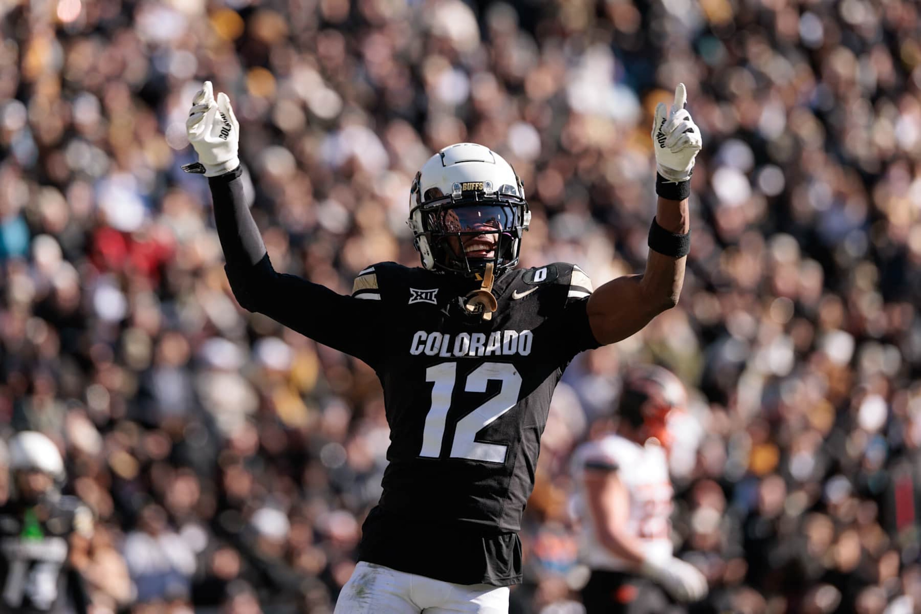 BOULDER, COLORADO - NOVEMBER 29: Travis Hunter #12 of the Colorado Buffaloes celebrates a touchdown during the third quarter against the Oklahoma State Cowboys at Folsom Field on November 29, 2024 in Boulder, Colorado. (Photo by Andrew Wevers/Getty Images) BOULDER, COLORADO - NOVEMBER 29: Travis Hunter #12 of the Colorado Buffaloes celebrates a touchdown during the third quarter against the Oklahoma State Cowboys at Folsom Field on November 29, 2024 in Boulder, Colorado. (Photo by Andrew Wevers/Getty Images)
