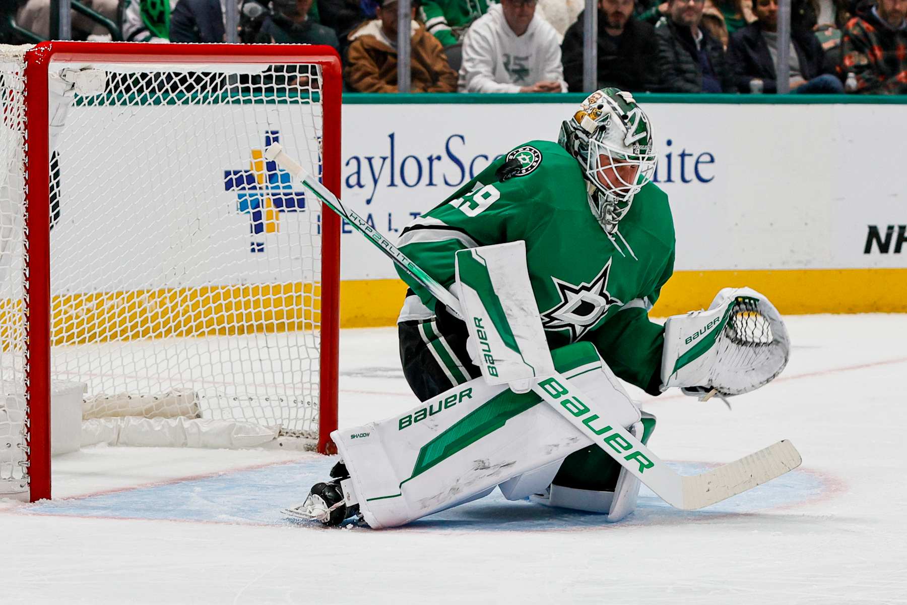 DALLAS, TX - DECEMBER 12: Dallas Stars goaltender Jake Oettinger (29) blocks a shot during the game between the Dallas Stars and the Nashville Predators on December 12, 2024 at American Airlines Center in Dallas, Texas. (Photo by Matthew Pearce/Icon Sportswire via Getty Images)
