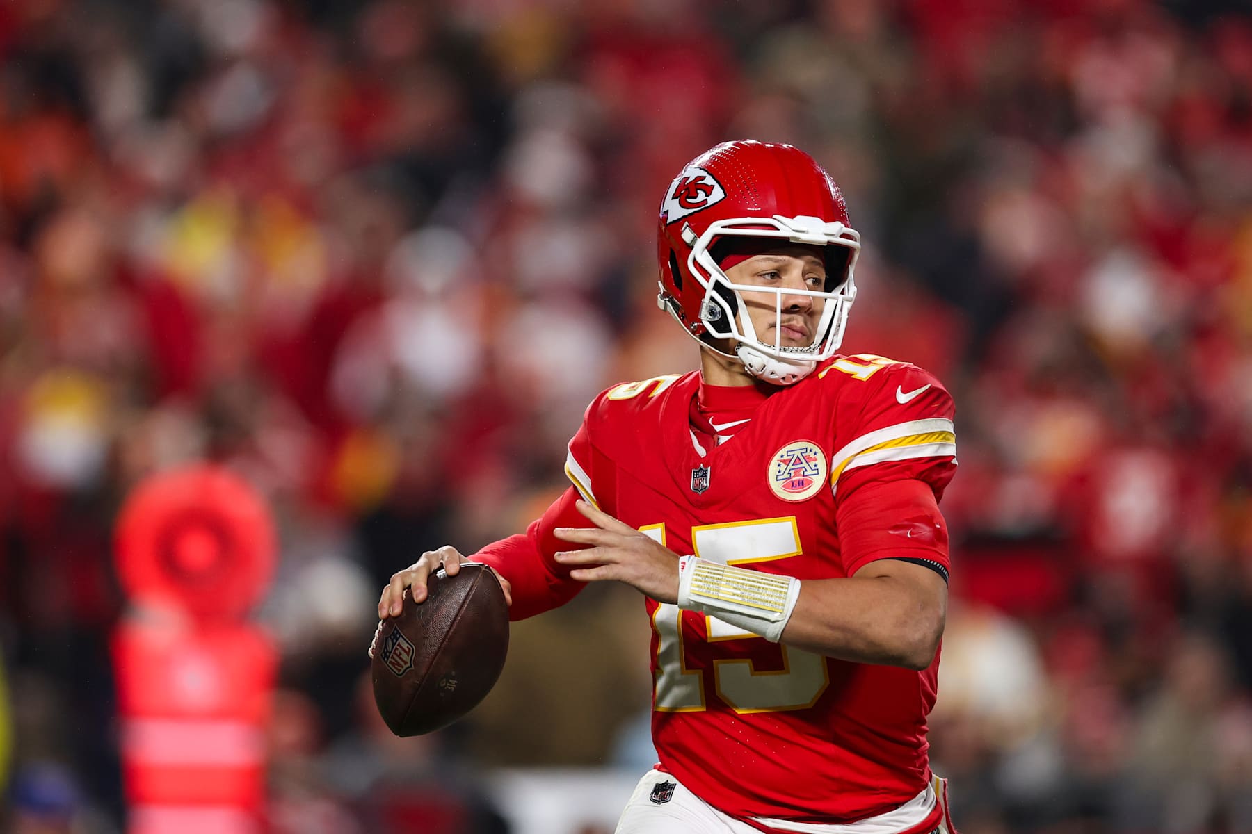 KANSAS CITY, MISSOURI - DECEMBER 08: Patrick Mahomes #15 of the Kansas City Chiefs throws the ball during an NFL football game against the Los Angeles Chargers at GEHA Field at Arrowhead Stadium on December 8, 2024 in Kansas City, Missouri. (Photo by Perry Knotts/Getty Images)