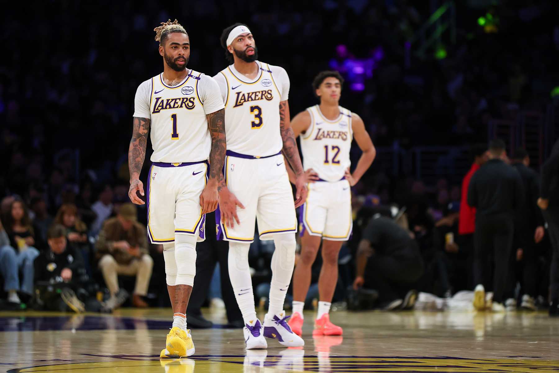 LOS ANGELES, CALIFORNIA - DECEMBER 08: D'Angelo Russell #1 and Anthony Davis #3 of the Los Angeles Lakers look on in the second half against the Portland Trail Blazers at Crypto.com Arena on December 08, 2024 in Los Angeles, California. NOTE TO USER: User expressly acknowledges and agrees that, by downloading and or using this Photograph, user is consenting to the terms and conditions of the Getty Images License Agreement. (Photo by Meg Oliphant/Getty Images)