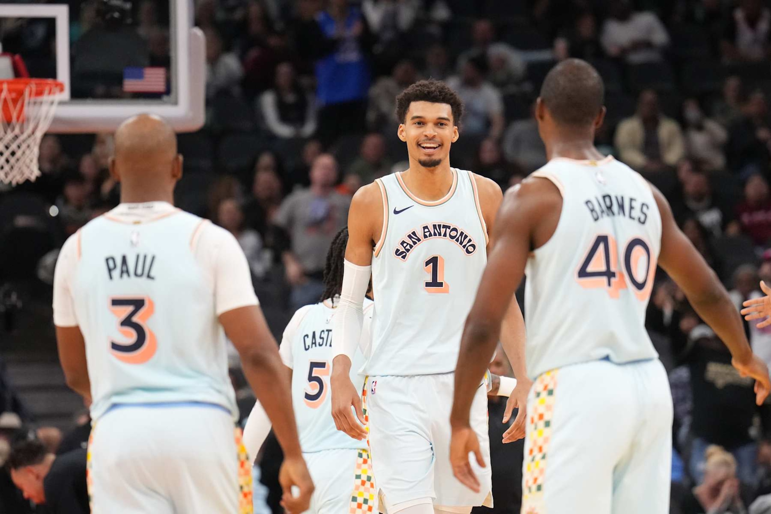 SAN ANTONIO, TX - DECEMBER 8: Victor Wembanyama #1 of the San Antonio Spurs smiles during the game against the New Orleans Pelicans on December 8, 2024 at the Frost Bank Center in San Antonio, Texas. NOTE TO USER: User expressly acknowledges and agrees that, by downloading and or using this photograph, user is consenting to the terms and conditions of the Getty Images License Agreement. Mandatory Copyright Notice: Copyright 2024 NBAE (Photos by Jesse D. Garrabrant/NBAE via Getty Images)