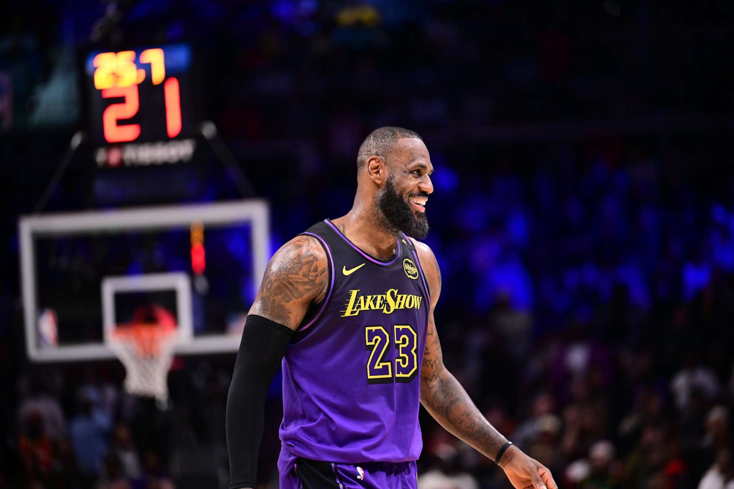 ATLANTA, GA - DECEMBER 6: LeBron James #23 of the Los Angeles Lakers smiles during the game against the Atlanta Hawks on December 6, 2024 at State Farm Arena in Atlanta, Georgia.  NOTE TO USER: User expressly acknowledges and agrees that, by downloading and/or using this Photograph, user is consenting to the terms and conditions of the Getty Images License Agreement. Mandatory Copyright Notice: Copyright 2024 NBAE (Photo by Adam Hagy/NBAE via Getty Images)