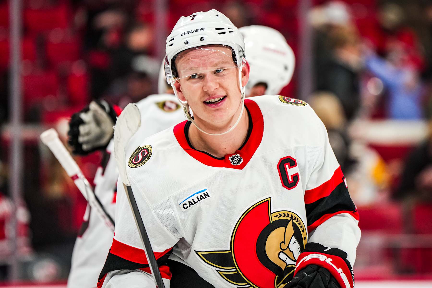 RALEIGH, NORTH CAROLINA - DECEMBER 13:  Brady Tkachuk #7 of the Ottawa Senators reacts after a 3-0 victory against the Carolina Hurricanes at Lenovo Center on December 13, 2024 in Raleigh, North Carolina.  (Photo by Cato Cataldo/NHLI via Getty Images)