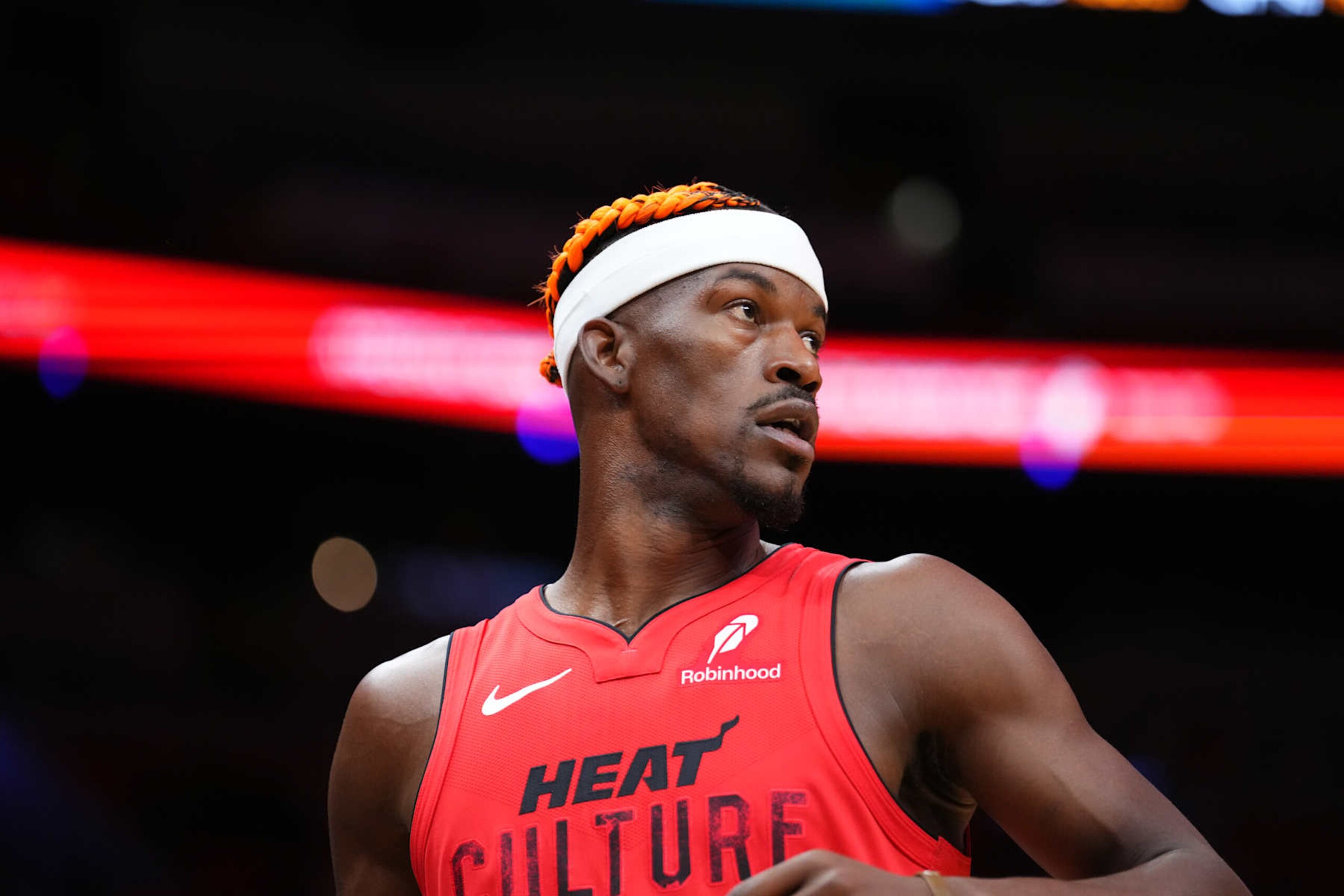 MIAMI, FLORIDA - DECEMBER 12: Jimmy Butler #22 of the Miami Heat looks on against the Toronto Raptors during the first quarter at Kaseya Center on December 12, 2024 in Miami, Florida. NOTE TO USER: User expressly acknowledges and agrees that, by downloading and or using this Photograph, user is consenting to the terms and conditions of the Getty Images License Agreement. (Photo by Rich Storry/Getty Images)