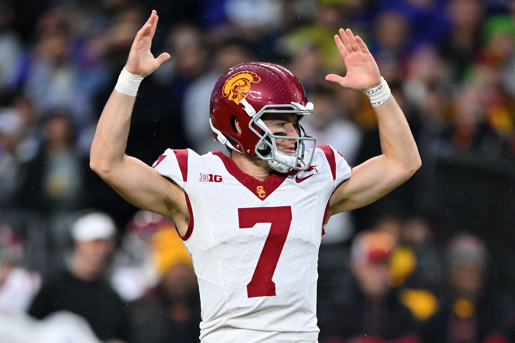 SEATTLE, WASHINGTON - NOVEMBER 02: Miller Moss #7 of the USC Trojans gestures touchdown during the second quarter of the game against the Washington Huskies at Husky Stadium on November 02, 2024 in Seattle, Washington. (Photo by Alika Jenner/Getty Images)