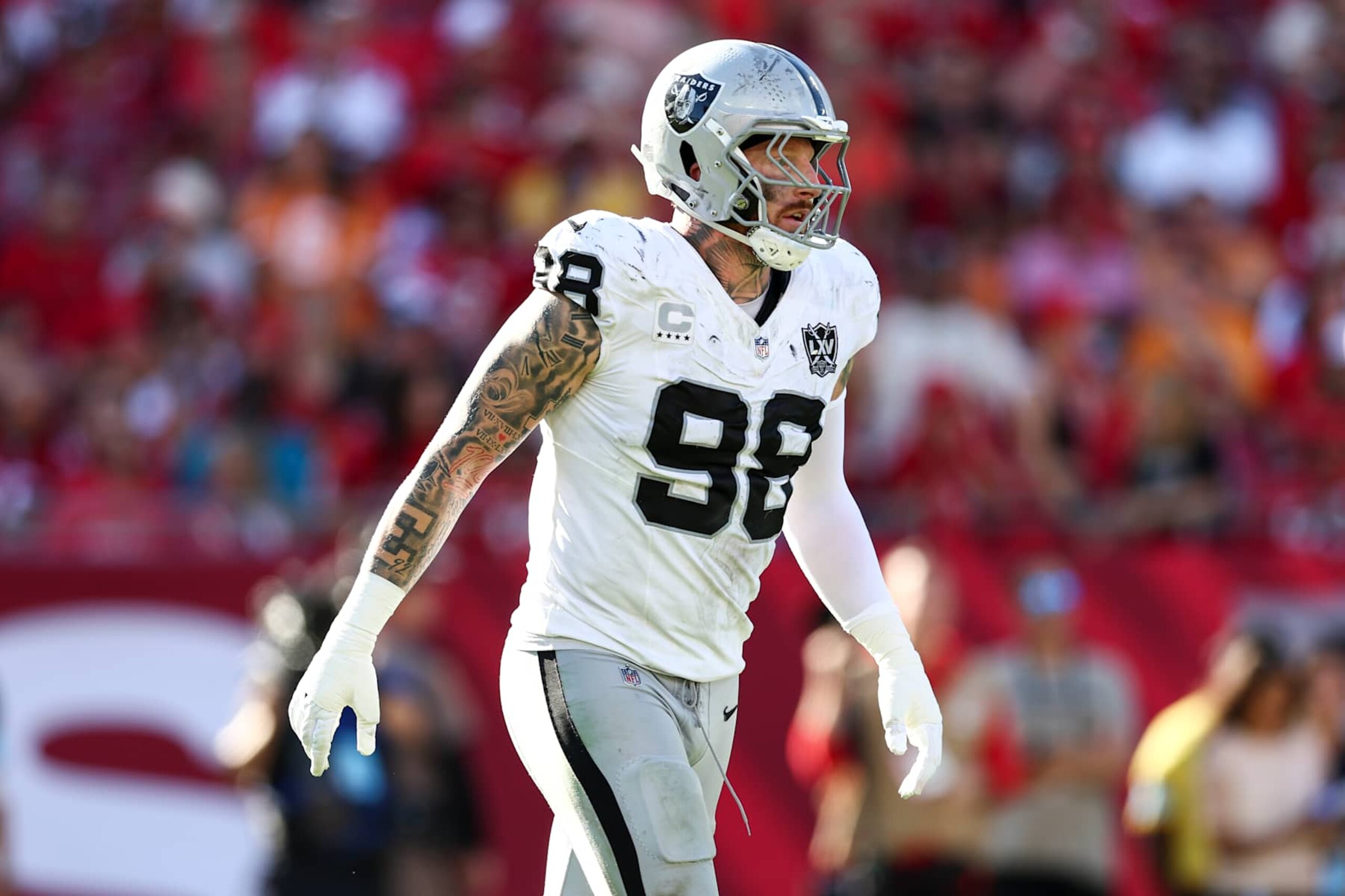 TAMPA, FLORIDA - DECEMBER 8: Maxx Crosby #98 of the Las Vegas Raiders reacts after a play during an NFL football game against the Tampa Bay Buccaneers at Raymond James Stadium on December 8, 2024 in Tampa, Florida. (Photo by Kevin Sabitus/Getty Images) TAMPA, FLORIDA - DECEMBER 8: Maxx Crosby #98 of the Las Vegas Raiders reacts after a play during an NFL football game against the Tampa Bay Buccaneers at Raymond James Stadium on December 8, 2024 in Tampa, Florida. (Photo by Kevin Sabitus/Getty Images)