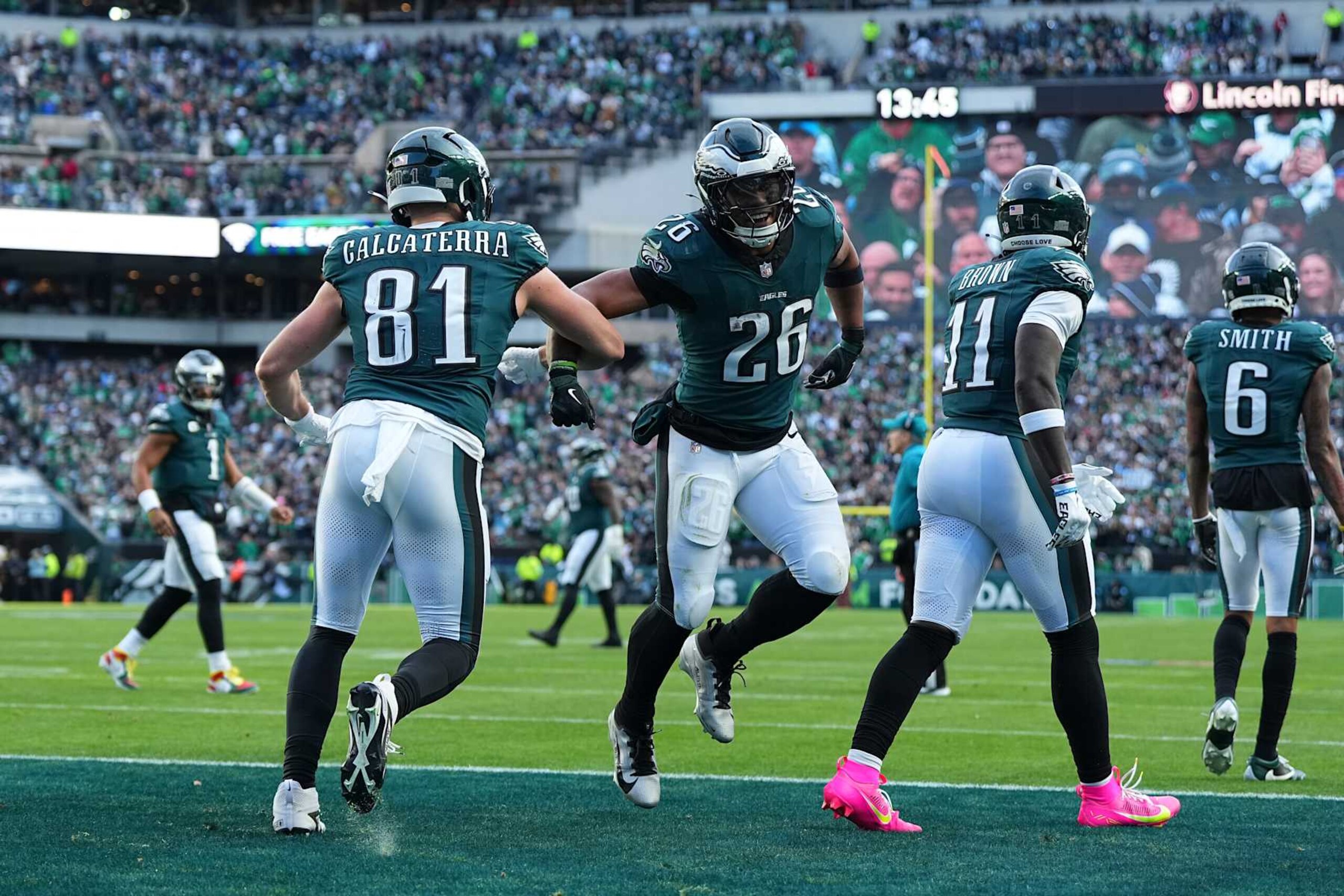PHILADELPHIA, PENNSYLVANIA - DECEMBER 8: Grant Calcaterra #81 of the Philadelphia Eagles celebrates with Saquon Barkley #26 against the Carolina Panthers at Lincoln Financial Field on December 8, 2024 in Philadelphia, Pennsylvania. (Photo by Mitchell Leff/Getty Images)