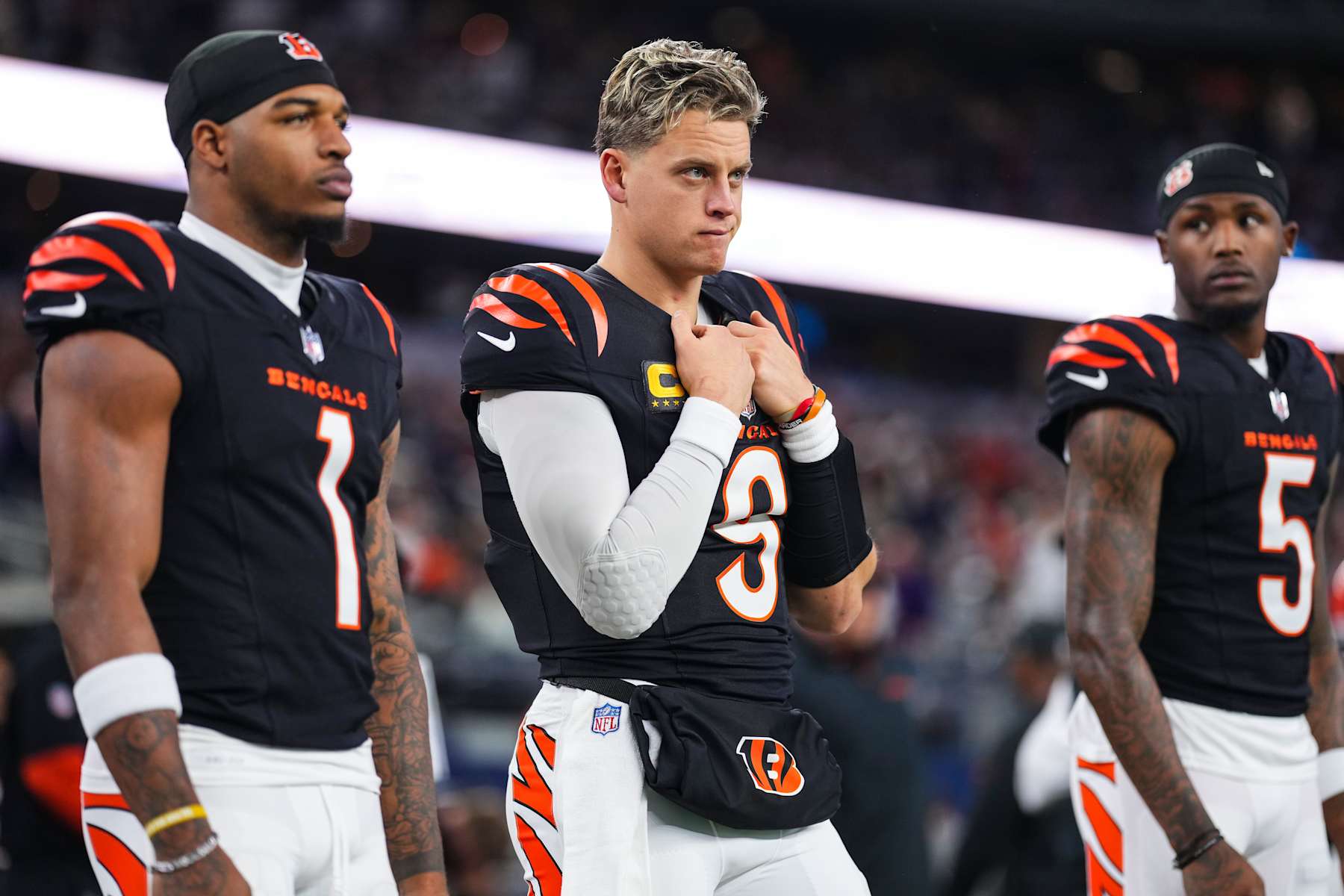 ARLINGTON, TX - DECEMBER 09: Joe Burrow #9 of the Cincinnati Bengals looks on from the sideline prior to an NFL football game against the Dallas Cowboys at AT&T Stadium on December 9, 2024 in Arlington, Texas. (Photo by Cooper Neill/Getty Images)