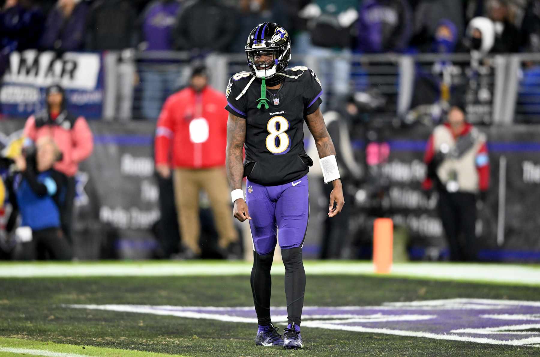 BALTIMORE, MARYLAND - DECEMBER 01: Lamar Jackson #8 of the Baltimore Ravens reacts to a play during the game against the Philadelphia Eagles at M&T Bank Stadium on December 01, 2024 in Baltimore, Maryland. (Photo by G Fiume/Getty Images)