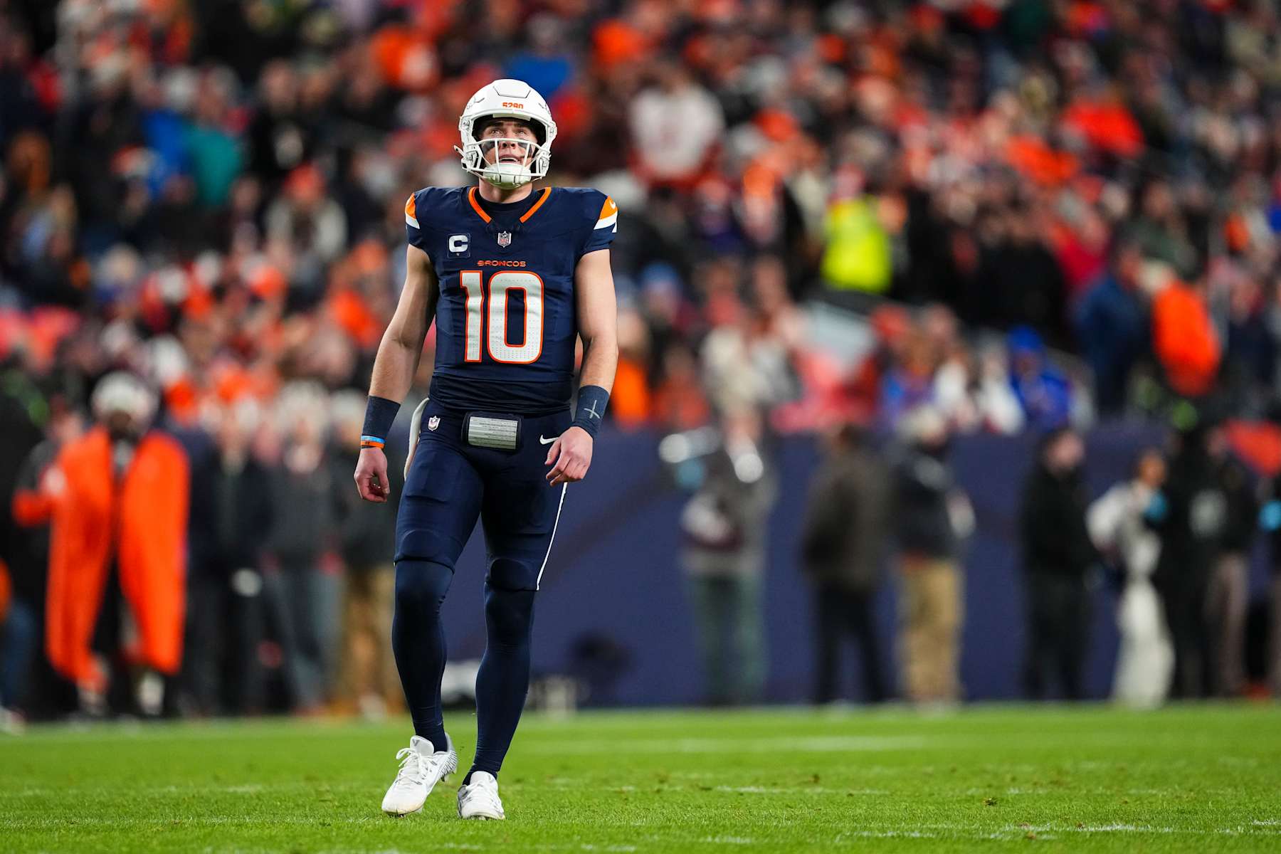 DENVER, CO - DECEMBER 02: Bo Nix #10 of the Denver Broncos looks on from the field during an NFL football game against the Cleveland Browns at Empower Field at Mile High on December 2, 2024 in Denver, Colorado. (Photo by Cooper Neill/Getty Images)