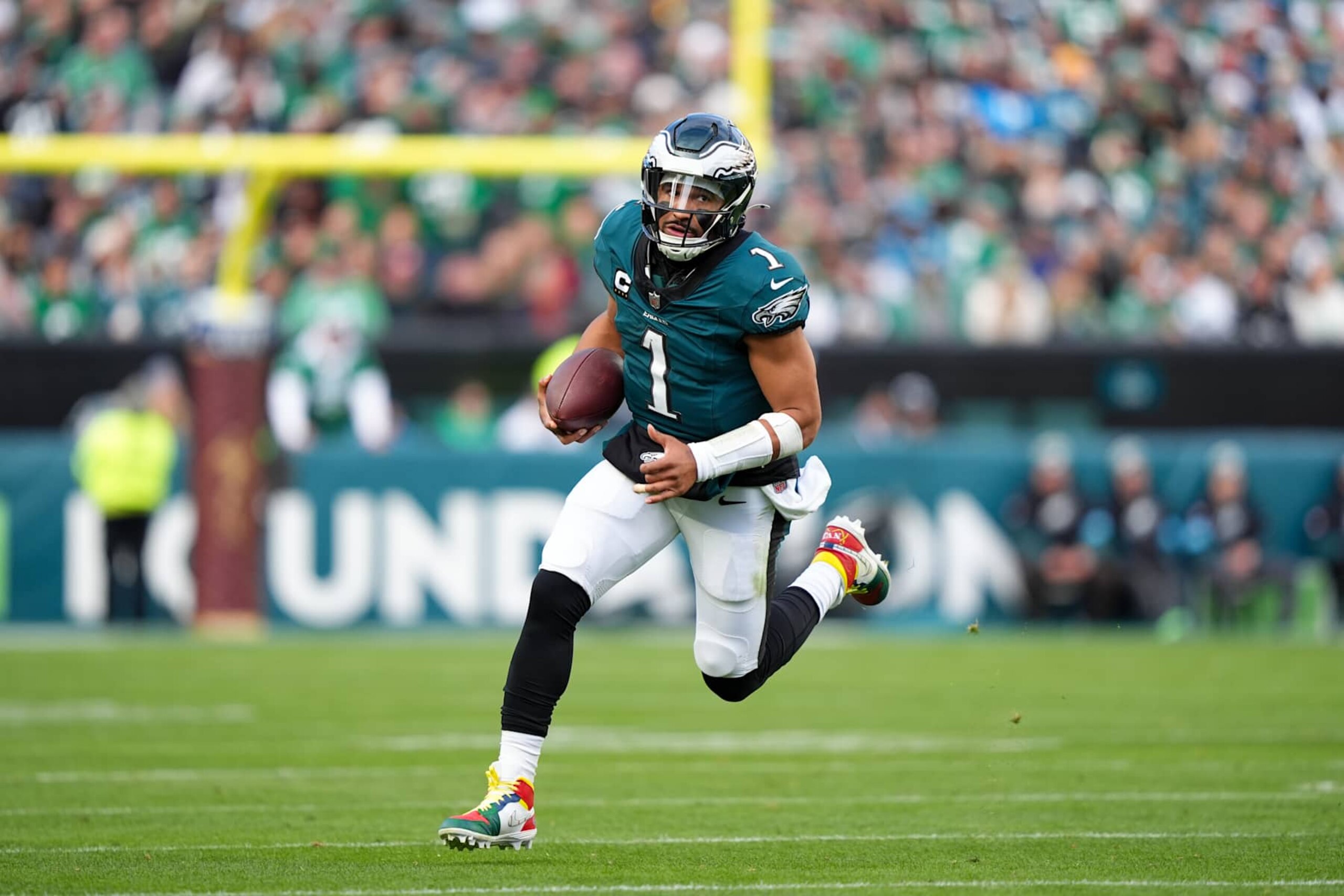 PHILADELPHIA, PA - DECEMBER 08: Philadelphia Eagles quarterback Jalen Hurts (1) carries the ball in the second half during the game between the Carolina Panthers and Philadelphia Eagles on December 08, 2024 at Lincoln Financial Field in Philadelphia, PA. (Photo by Kyle Ross/Icon Sportswire via Getty Images)