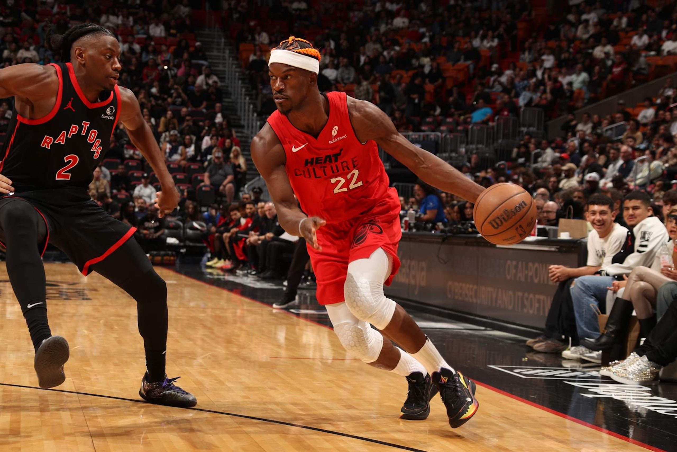 MIAMI, FL - DECEMBER 12:  Jimmy Butler #22 of the Miami Heat dribbles the ball during the game against the Toronto Raptors on December 12, 2024 at Kaseya Center in Miami, Florida. NOTE TO USER: User expressly acknowledges and agrees that, by downloading and or using this Photograph, user is consenting to the terms and conditions of the Getty Images License Agreement. Mandatory Copyright Notice: Copyright 2024 NBAE (Photo by Issac Baldizon/NBAE via Getty Images)