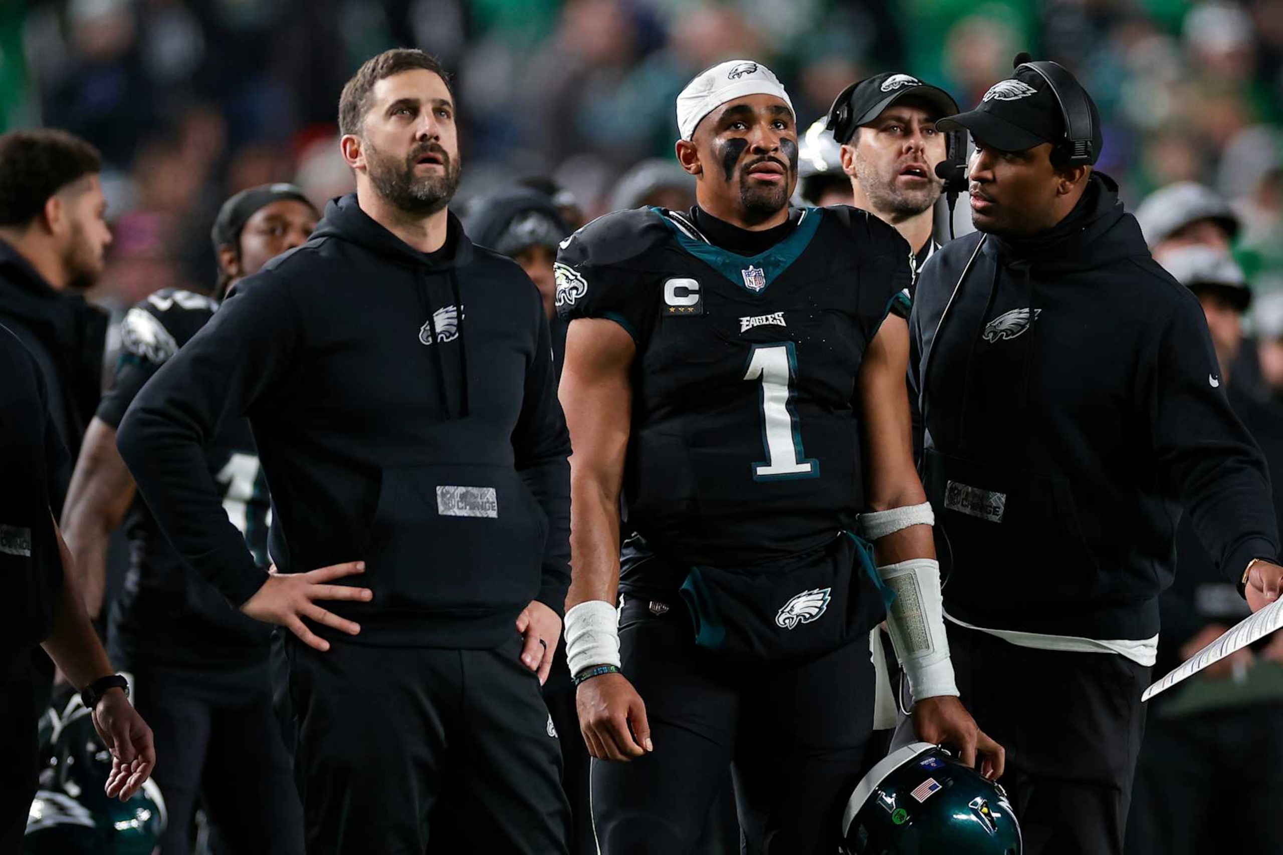 PHILADELPHIA, PENNSYLVANIA - DECEMBER 25: Philadelphia Eagles head coach Nick Sirianni and Jalen Hurts #1 of the Philadelphia Eagles look on against the New York Giants at Lincoln Financial Field on December 25, 2023 in Philadelphia, Pennsylvania. (Photo by Adam Hunger/Getty Images)