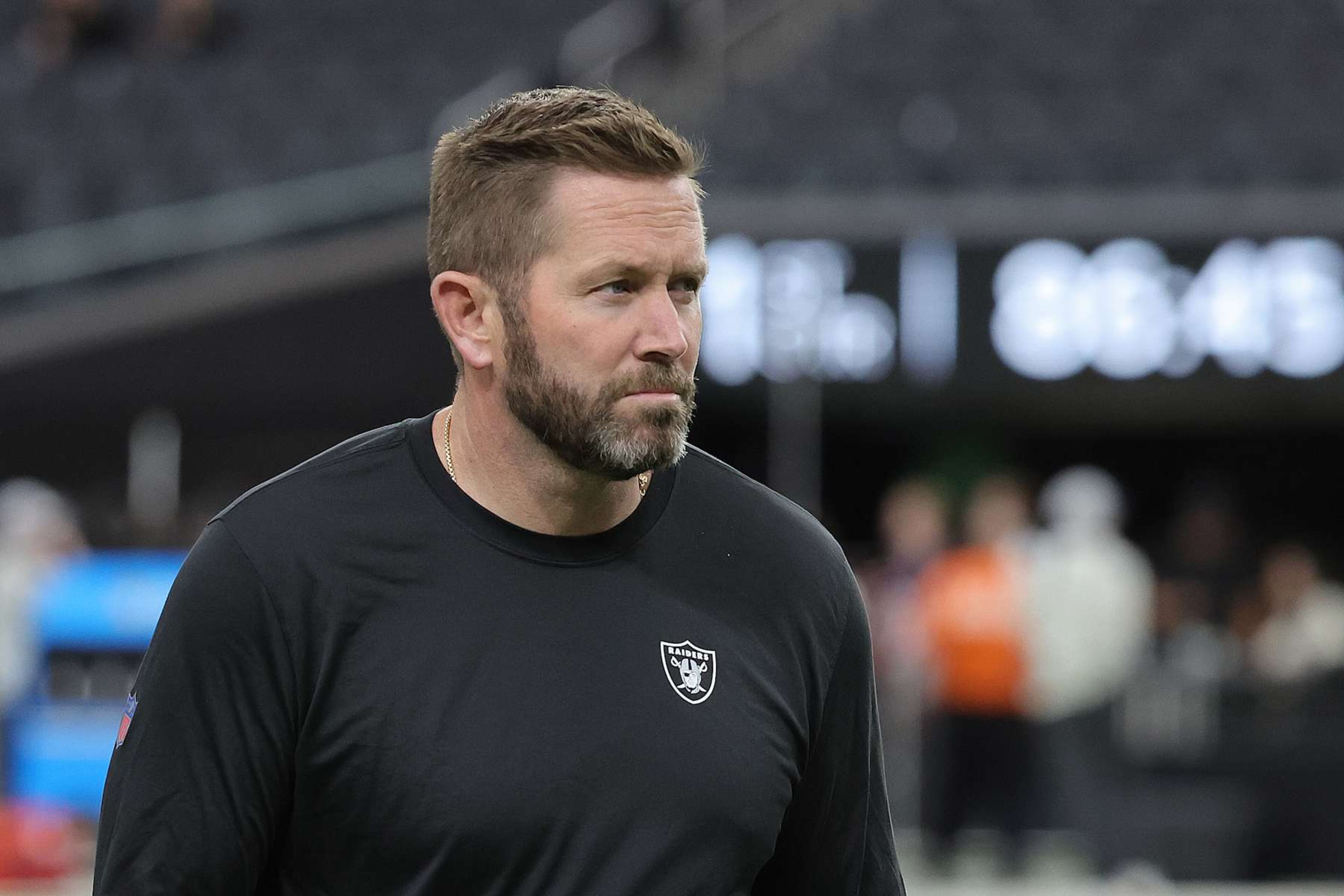 LAS VEGAS, NEVADA - NOVEMBER 24: Interim offensive coordinator Scott Turner of the Las Vegas Raiders looks on during warmups before a game against the Denver Broncos at Allegiant Stadium on November 24, 2024 in Las Vegas, Nevada. (Photo by Ethan Miller/Getty Images) LAS VEGAS, NEVADA - NOVEMBER 24: Interim offensive coordinator Scott Turner of the Las Vegas Raiders looks on during warmups before a game against the Denver Broncos at Allegiant Stadium on November 24, 2024 in Las Vegas, Nevada. (Photo by Ethan Miller/Getty Images)